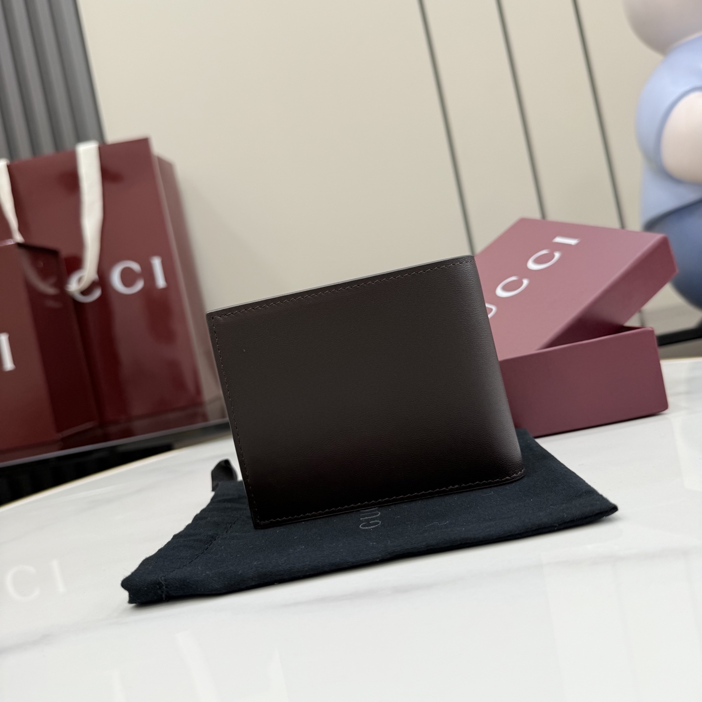 gucci dark brown leather bifold metal tag wallet