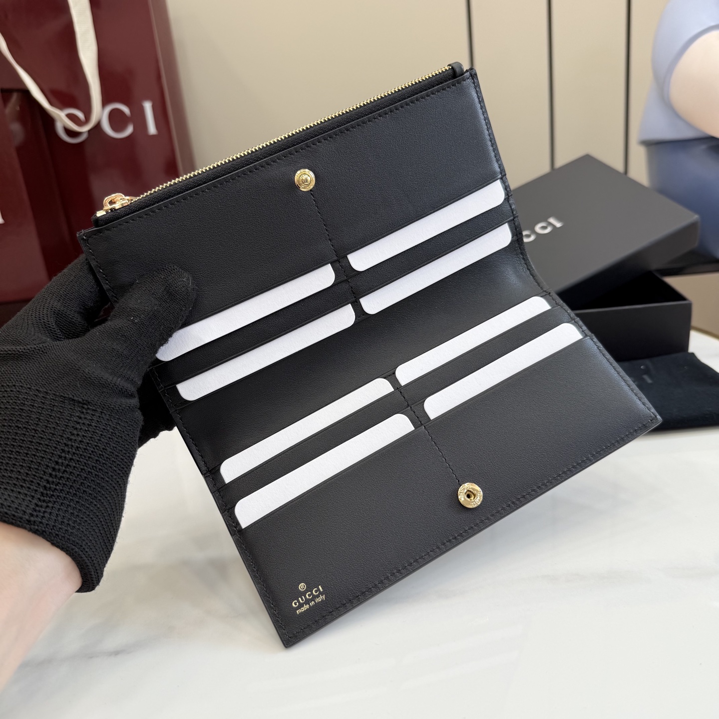 gucci black perforated gg leather long wallet