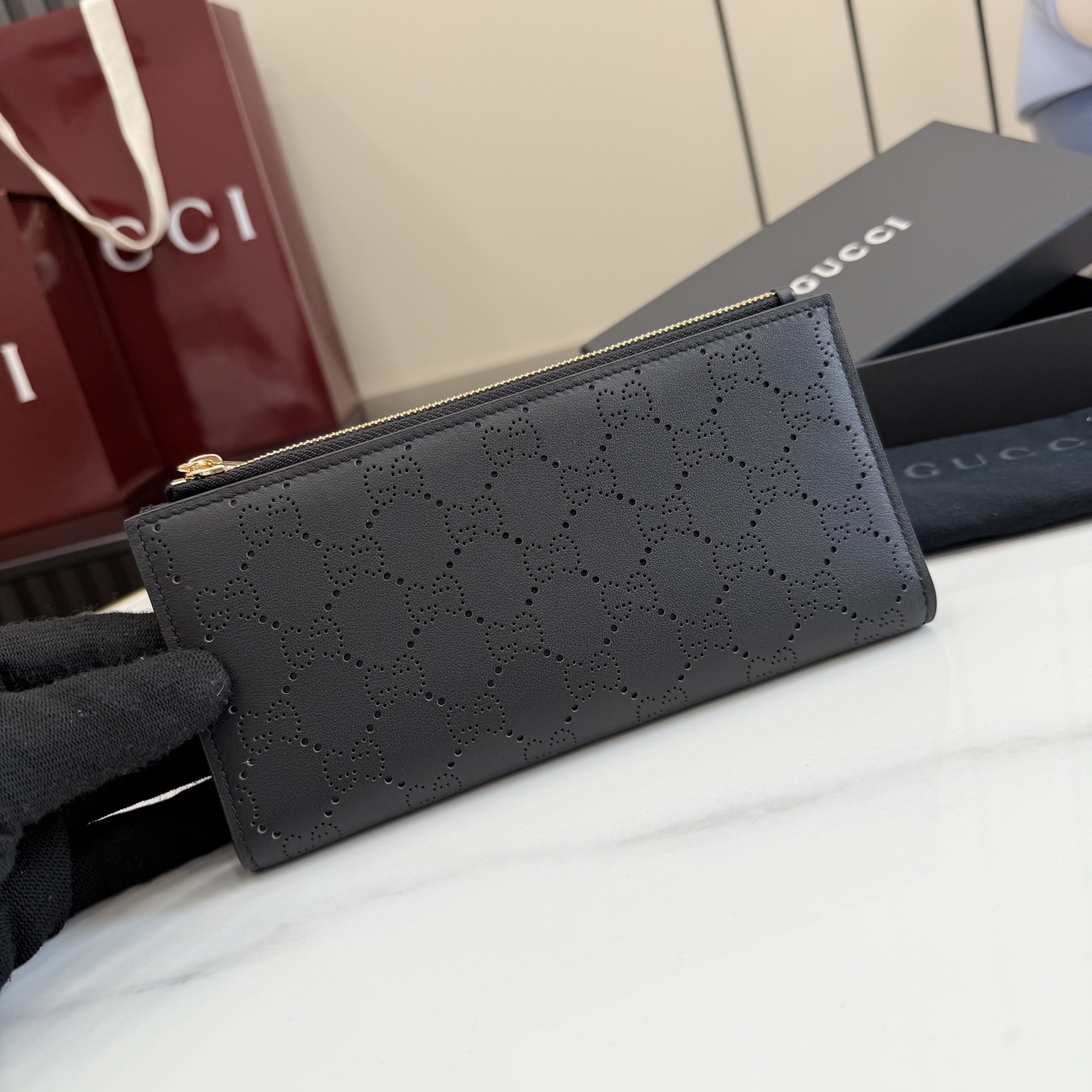 gucci black perforated gg leather long wallet