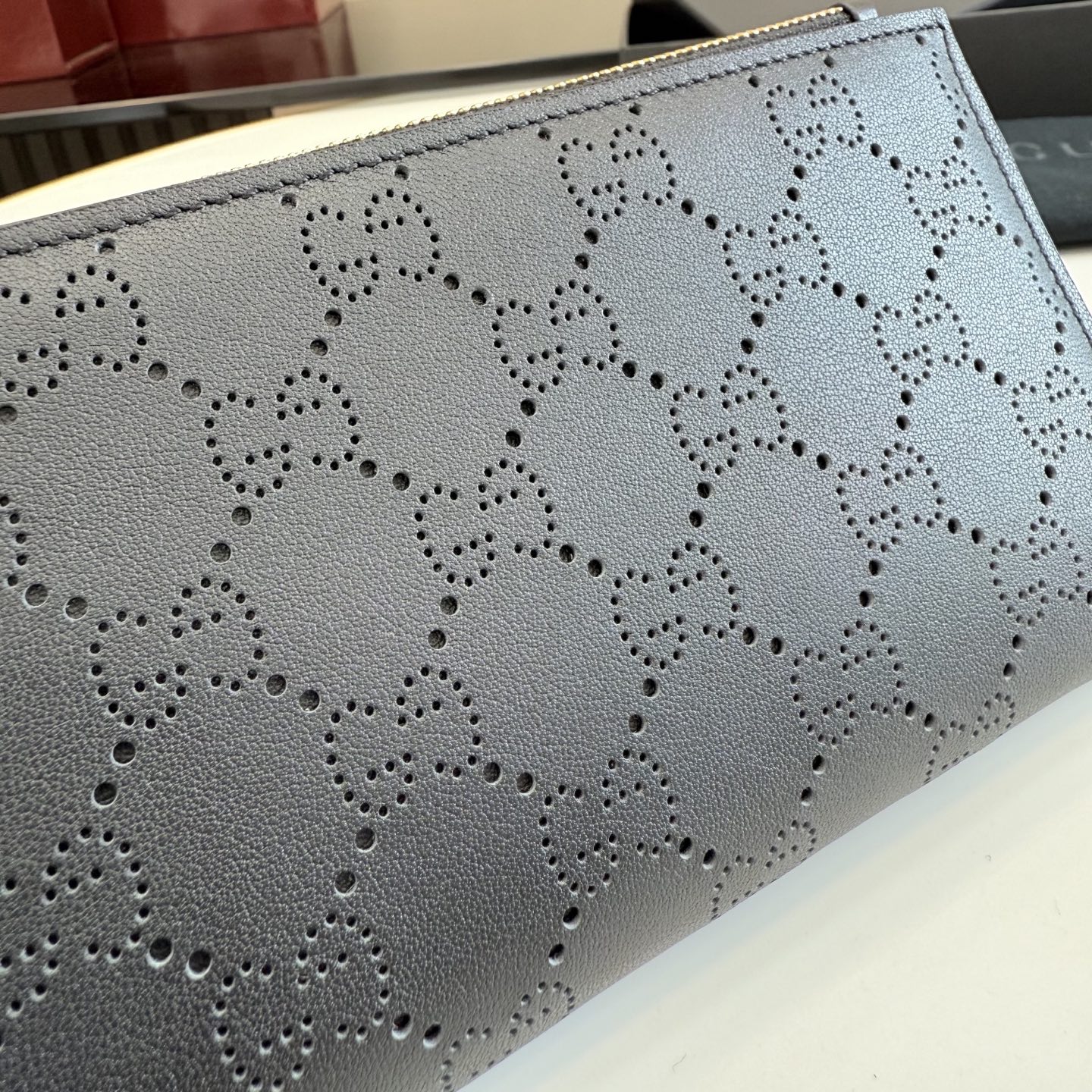 gucci black perforated gg leather long wallet