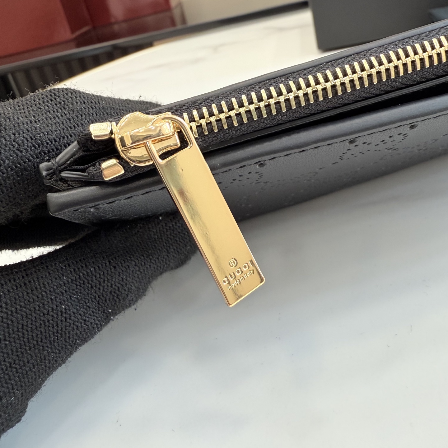gucci black perforated gg leather long wallet