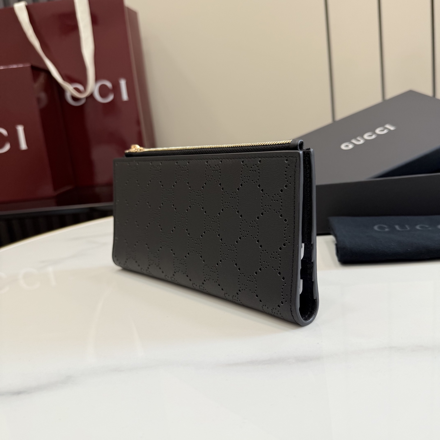 gucci black perforated gg leather long wallet
