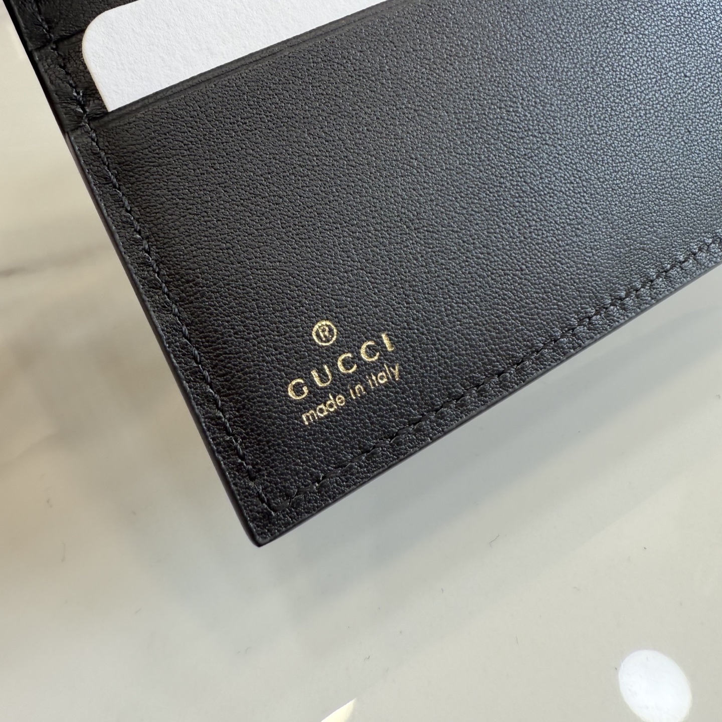 gucci black perforated gg leather long wallet