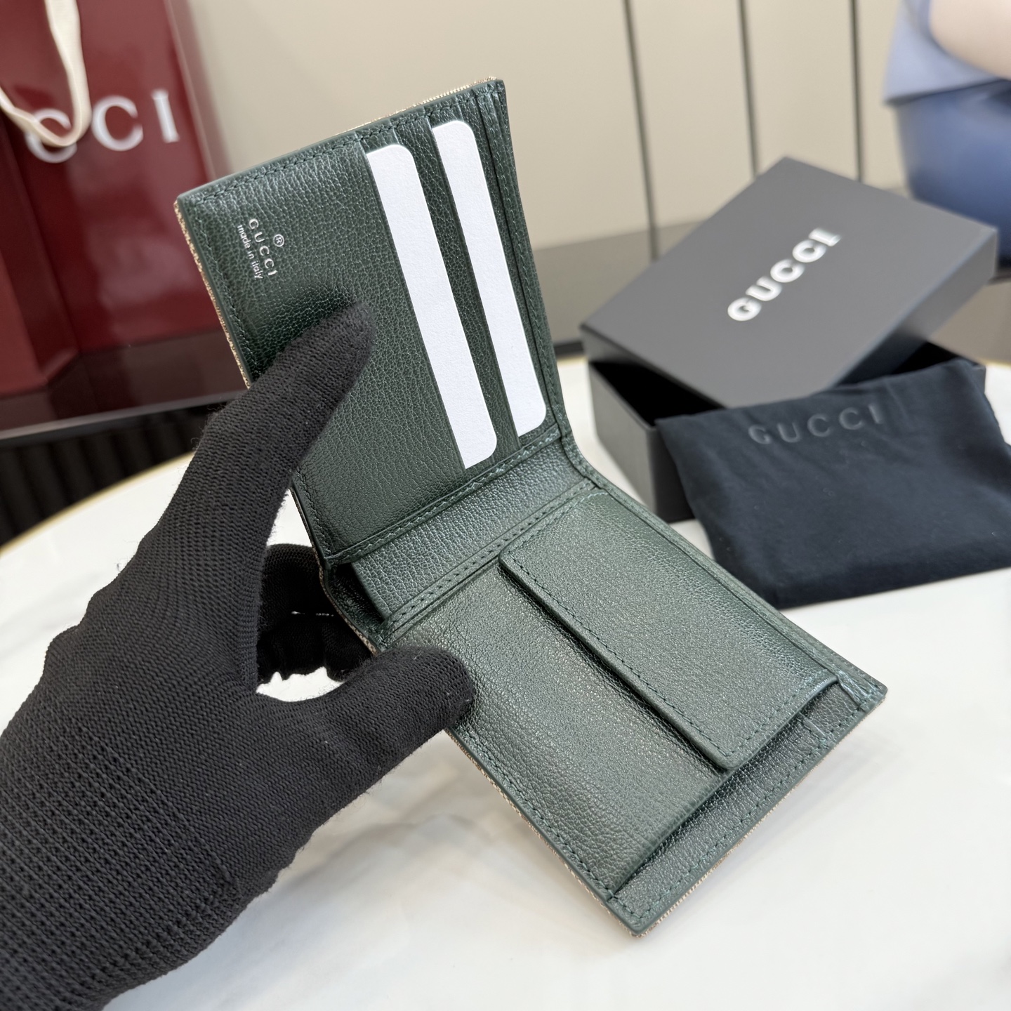 gucci essence classic gg canvas bifold wallet