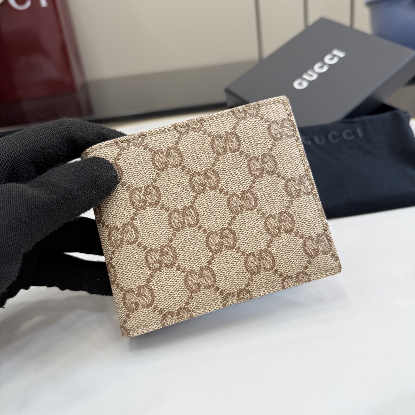 gucci essence classic gg canvas bifold wallet