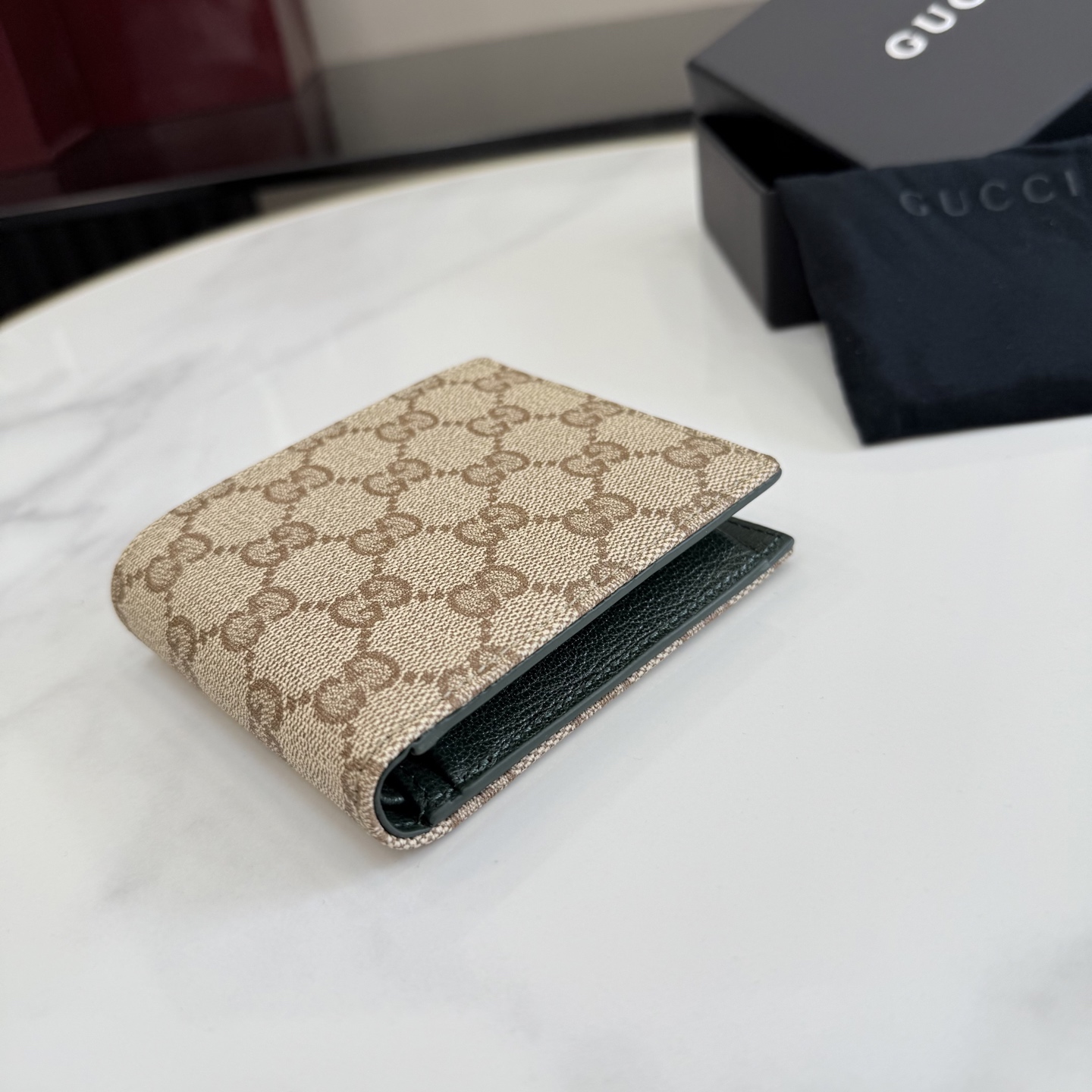 gucci essence classic gg canvas bifold wallet