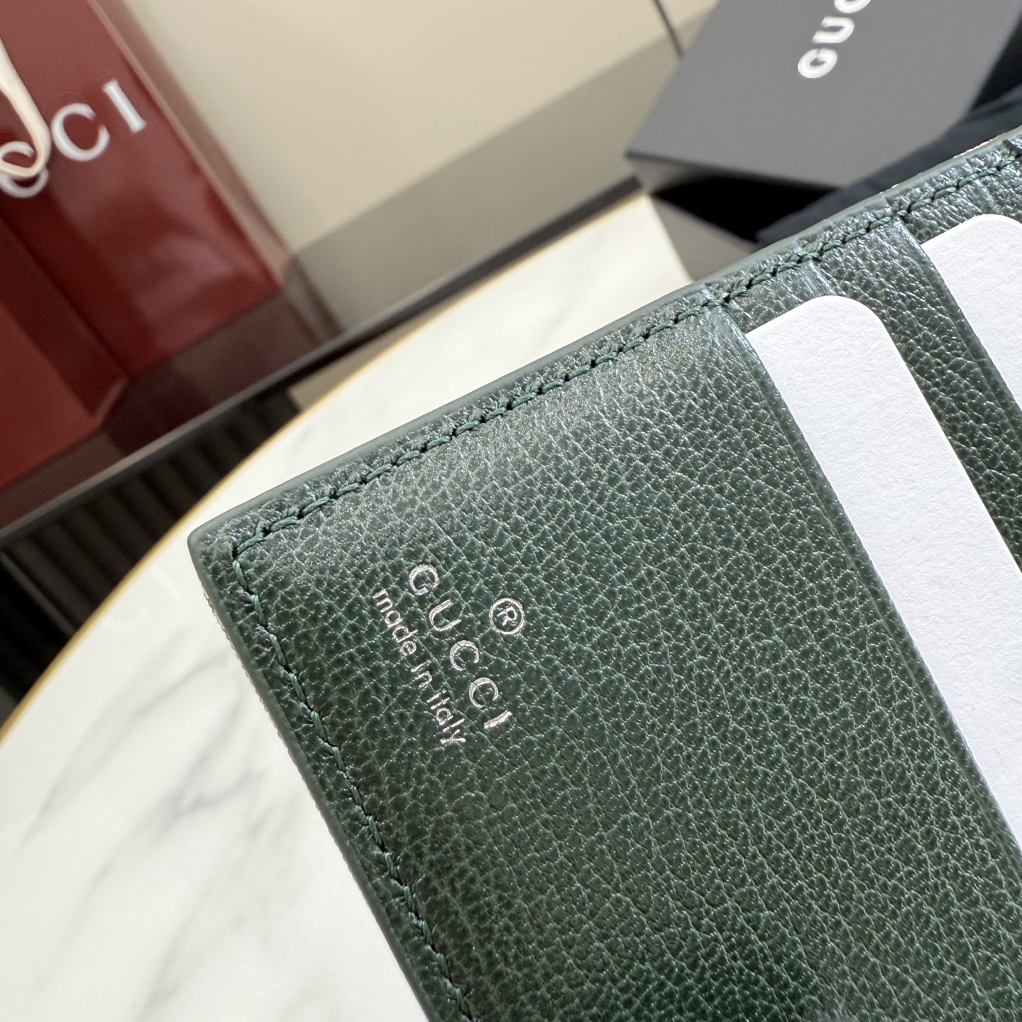 gucci essence classic gg canvas bifold wallet
