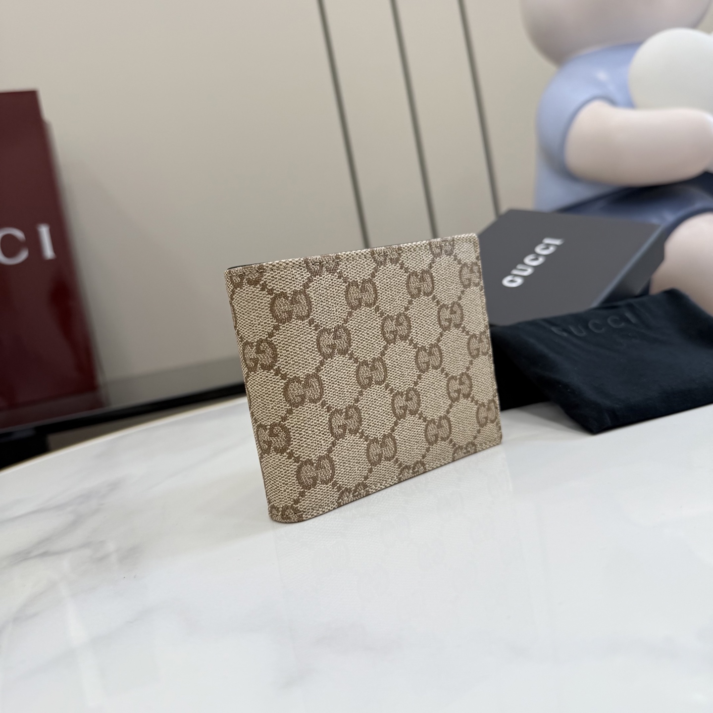 gucci essence classic gg canvas bifold wallet