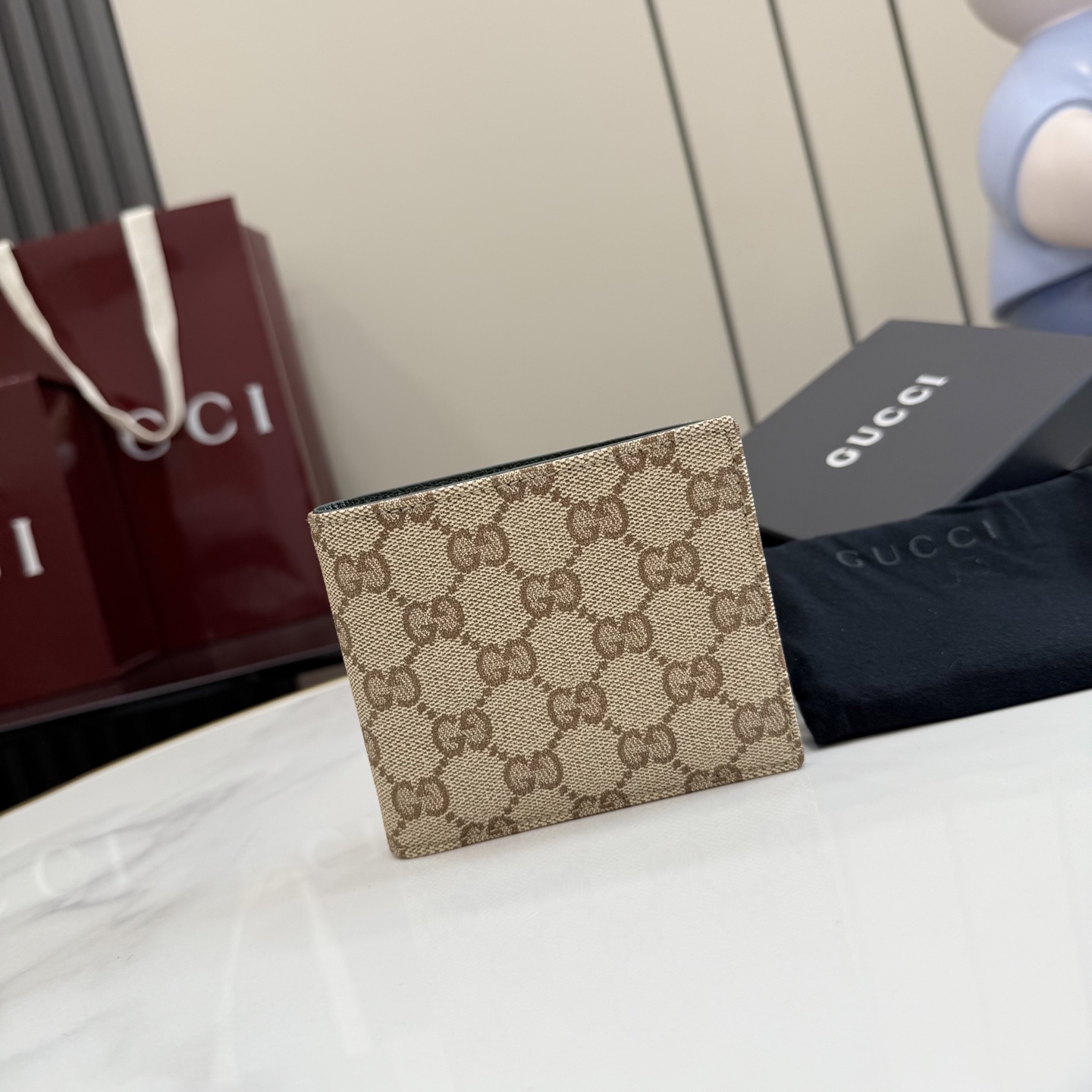 gucci essence classic gg canvas bifold wallet