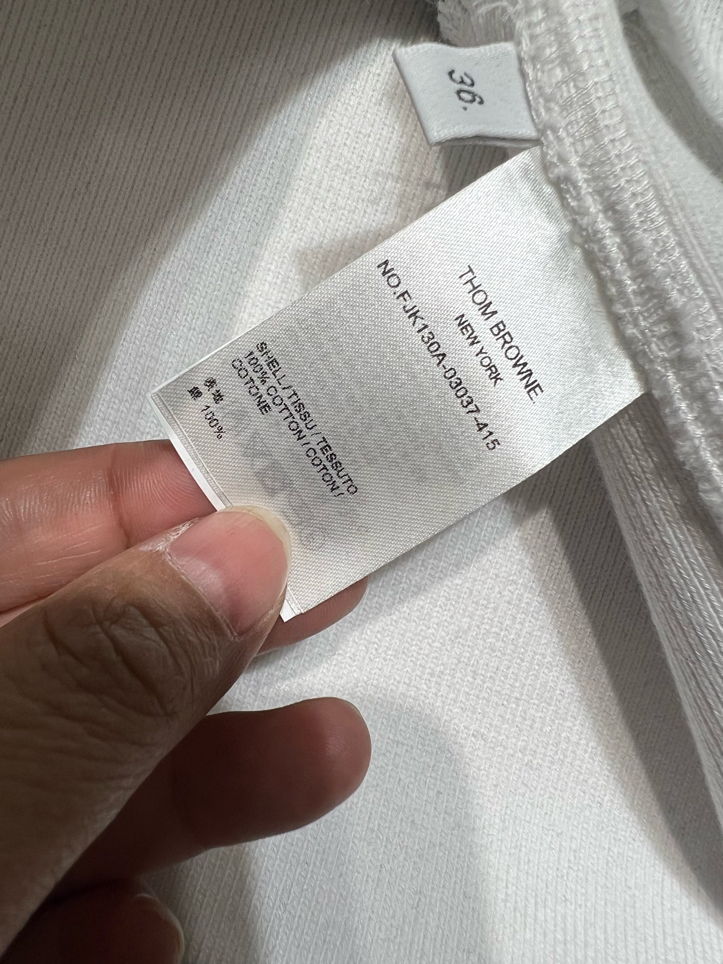 “THOM BROWN Women’s Clothing: Classic Striped Zipper Chain Miniskirts and Customized Originals” - 图片 8