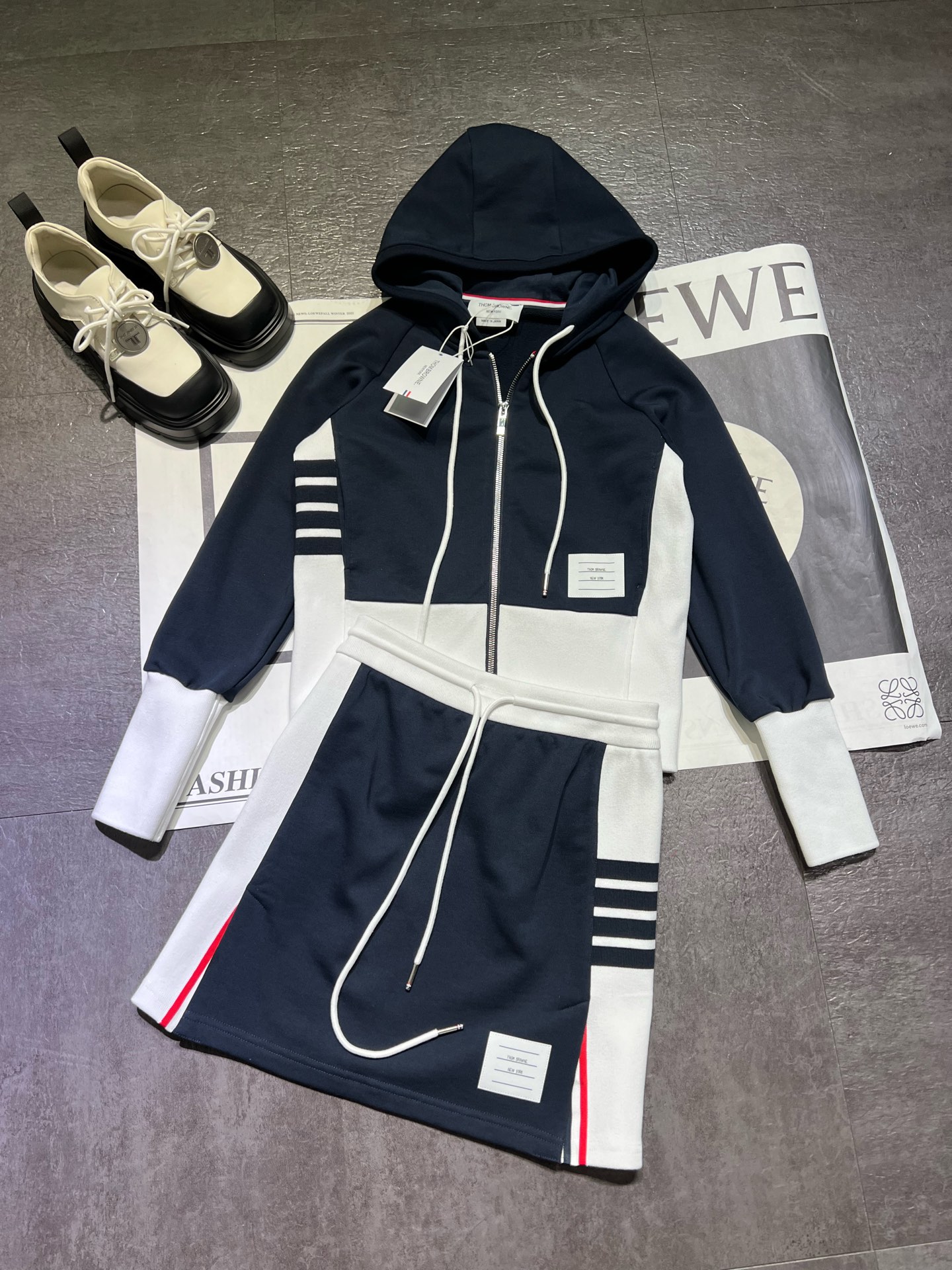 “THOM BROWN Women’s Clothing: Classic Striped Zipper Chain Miniskirts and Customized Originals”