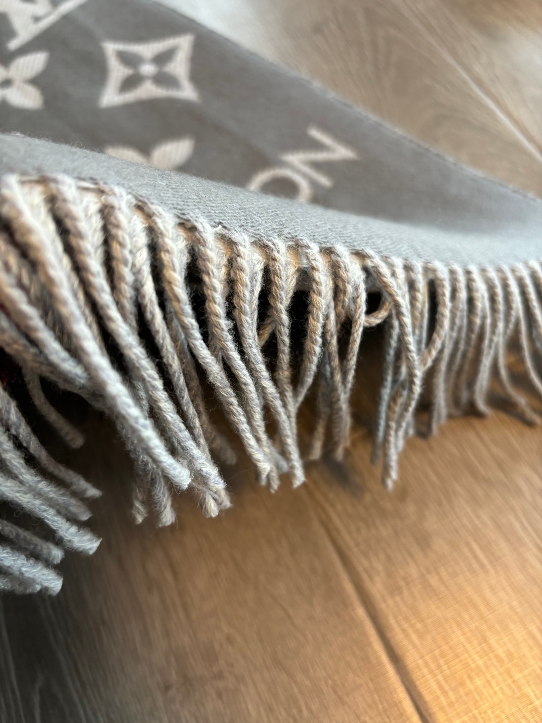 Finished with slender fringe along both ends, this scarf combines a - Scarf