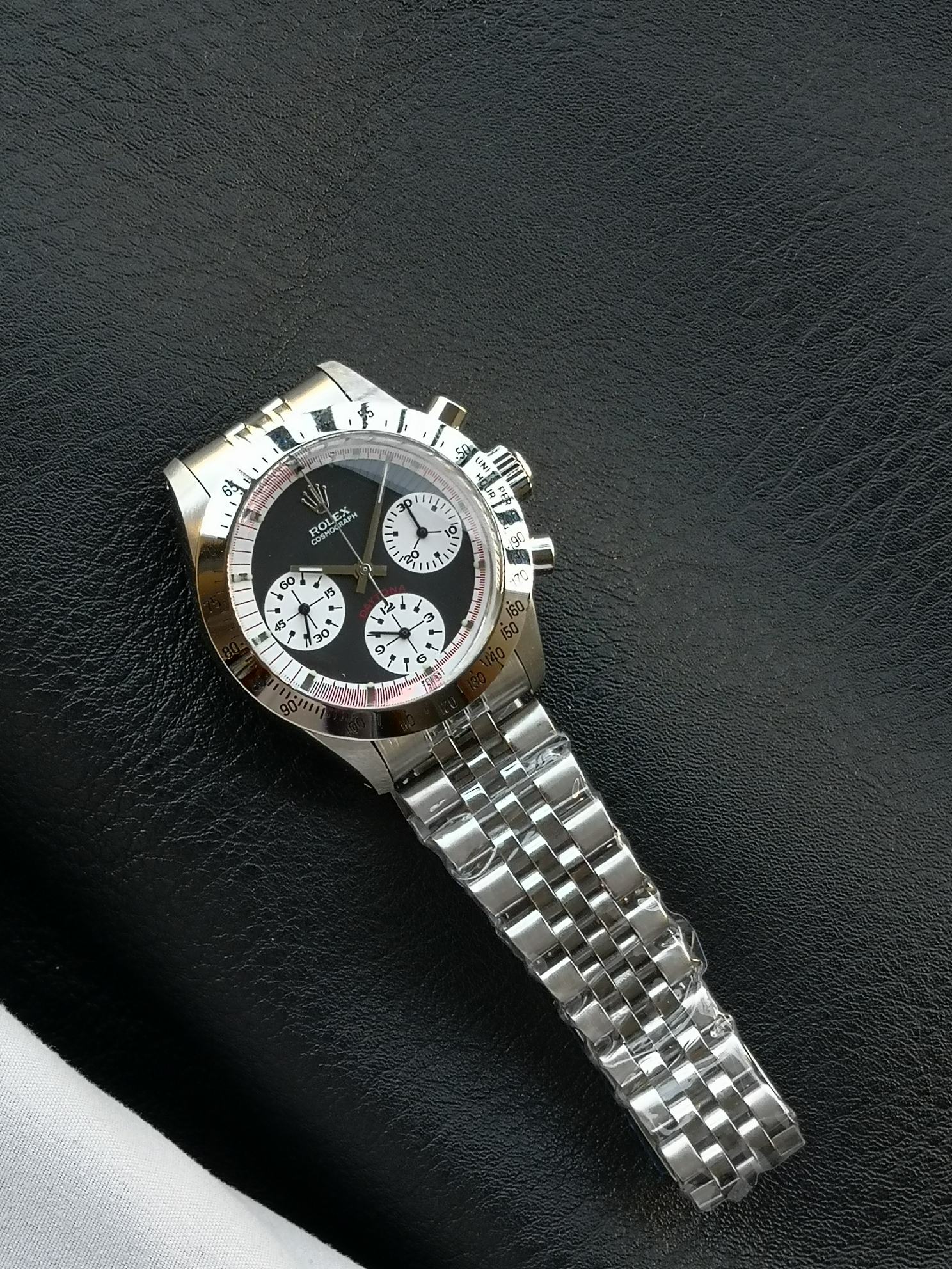 NO:619449,MSF Rolex Tiffany co-branded Daytona, 37mm diameter, black panda dial with white chronograph sub-dial, classic snail cover mirror design. Stainless steel case with steel strap buckle, equipped with WM-manual chronograph movement.,,rolex19860909MSF 劳力士 Tiffany联名款迪通拿,37mm表径,黑色熊猫盘面搭配白色计时小表盘,经典蜗盖镜面设计.精钢表壳搭配钢带表扣,搭载WM-手动计时机芯.,,rolex,Watch