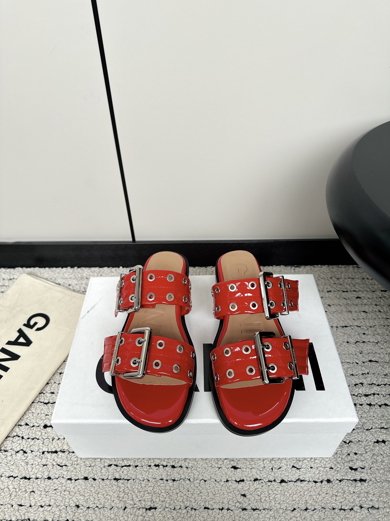 Ganni Summer Collection: Round Head Slippers with Belt Buckle Detail.