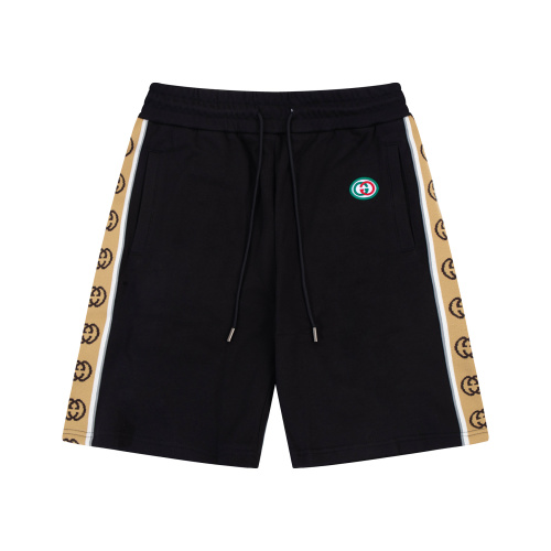 Short de sport Gucci noir avec bande logo et logo Double G brodé 1 Short de sport Gucci noir avec bande logo et logo Double G brodé