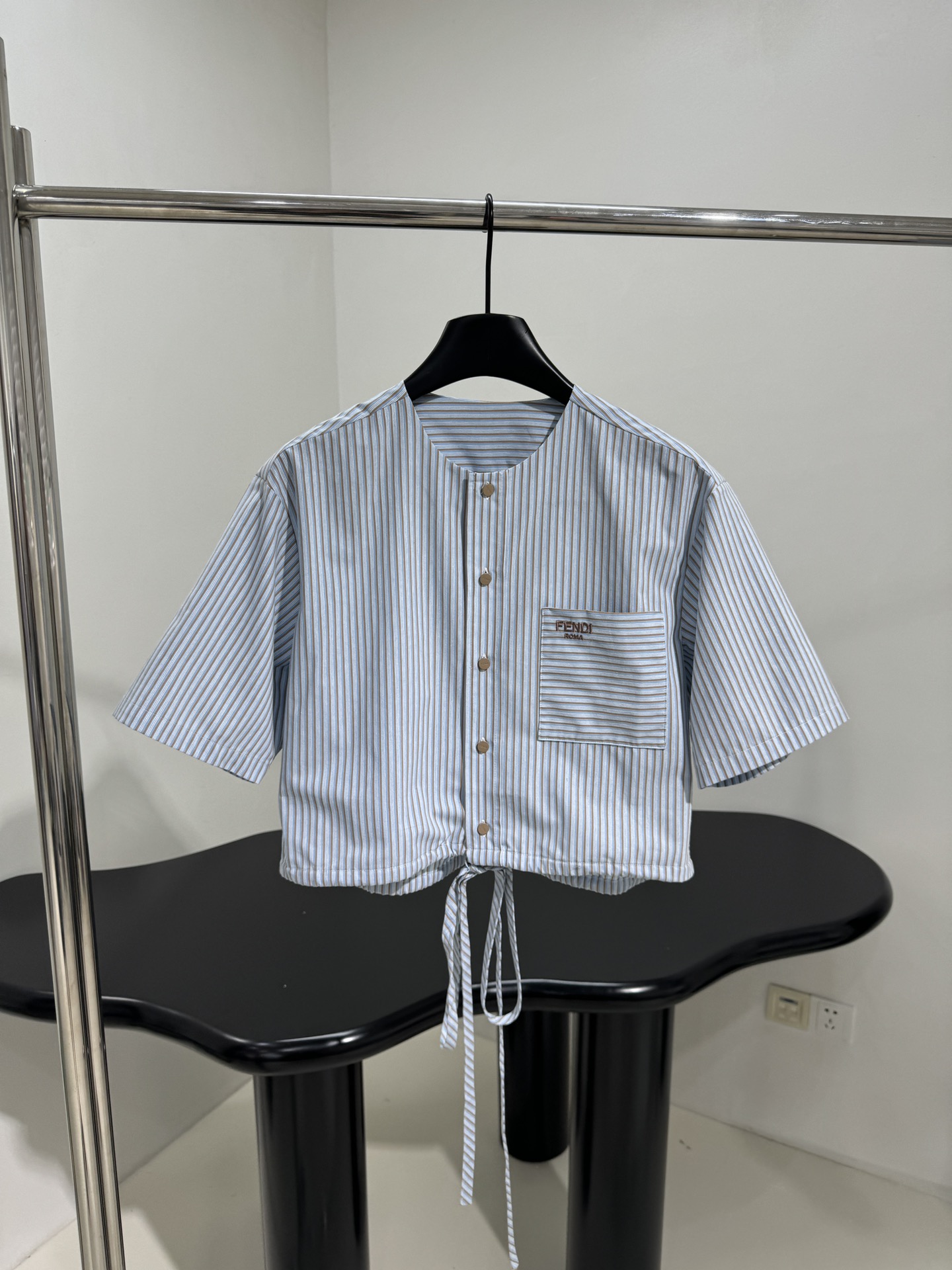 Fashion Summary: Tweedy Female Suit with Age Reduction Design and Brand Embroidery