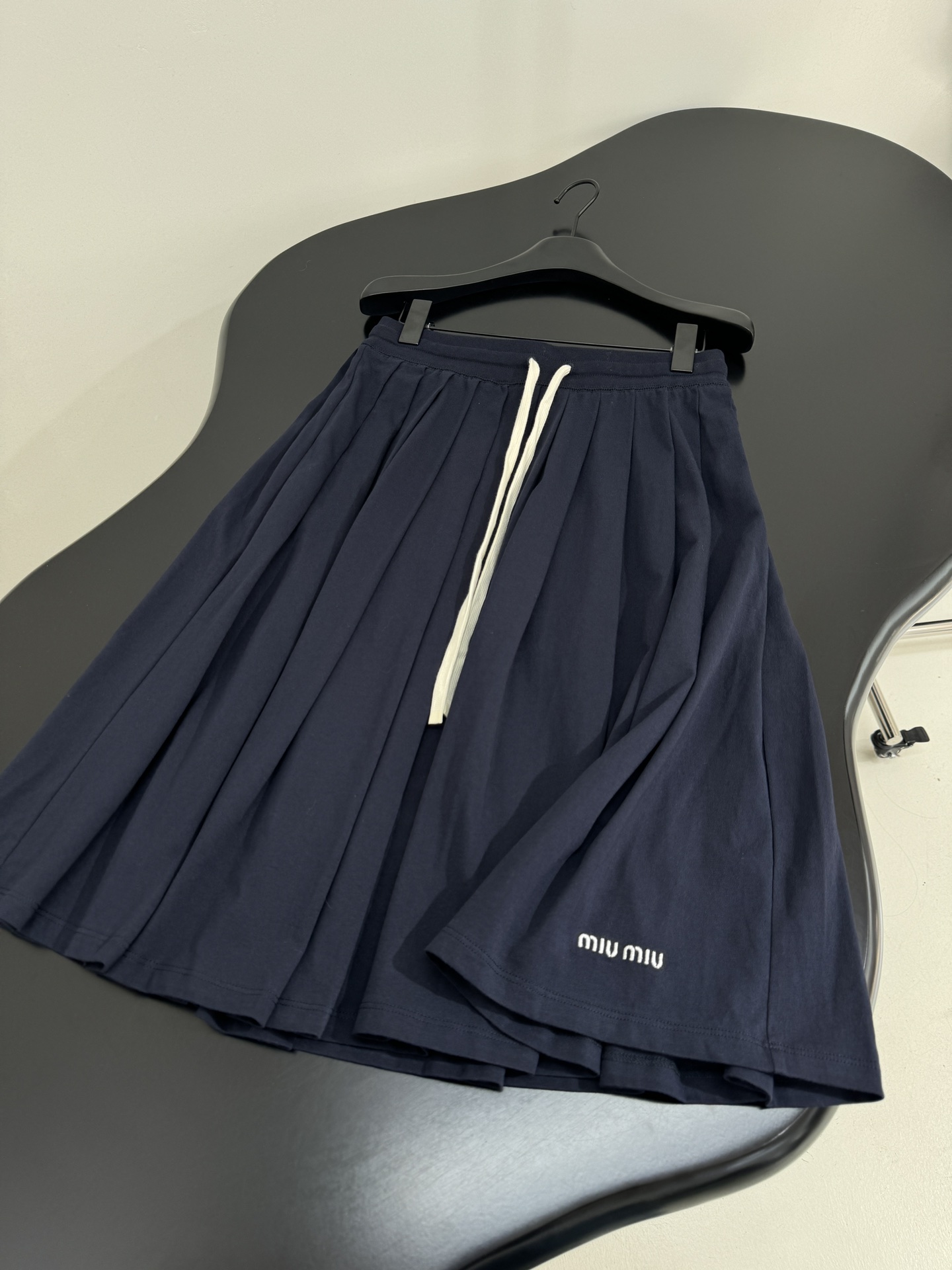 Miu Miu Pleated Navy Knit Midi Skirt with Embroidered Logo 6 i1753870949 5934 0