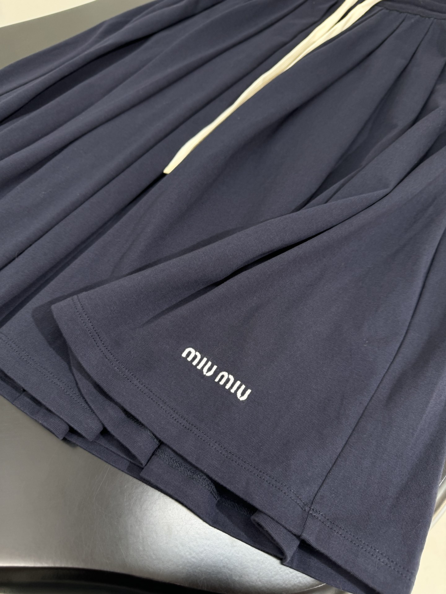 Miu Miu Pleated Navy Knit Midi Skirt with Embroidered Logo 7 i1753870949 8115 1