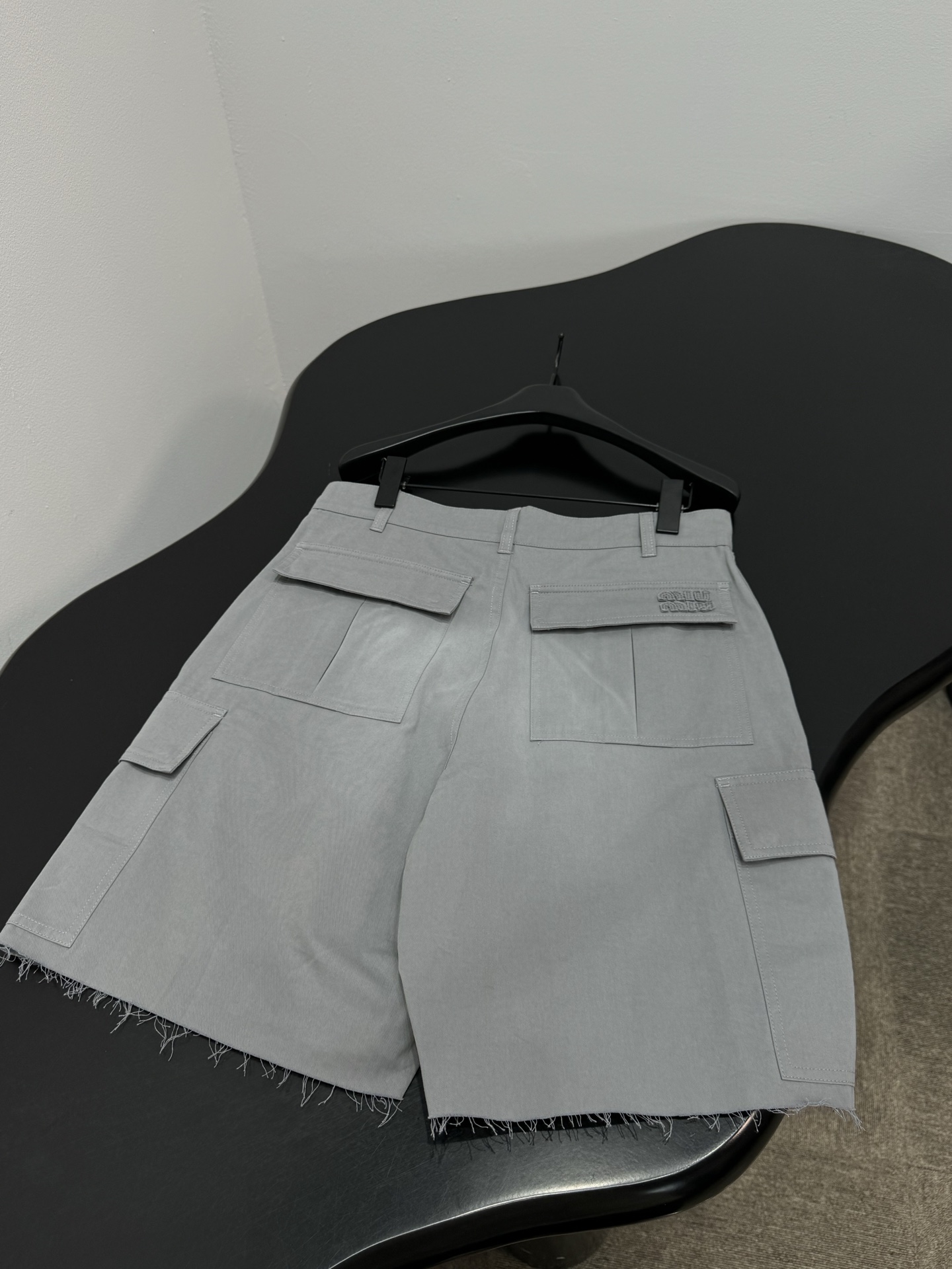 MIUMIU Grey Raw Edge Cargo Shorts
