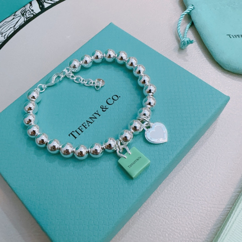 Tiffany & Co. Silver Beaded Bracelet with Heart and Shopping Bag Charms