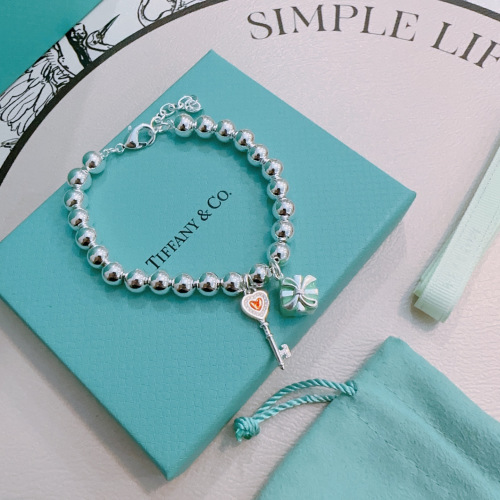 Tiffany & Co. Silver Bead Bracelet with Heart Key and Gift Charms 1 Tiffany & Co. Silver Bead Bracelet with Heart Key and Gift Charms