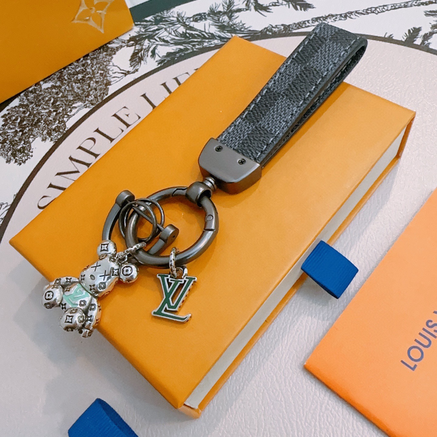 Louis Vuitton Anger Forest Bear Keychain pendant gunmetal gray metal dark gray damier graphite coated canvas mint green enamel dark green enamel silver-tone metal 12cm total length