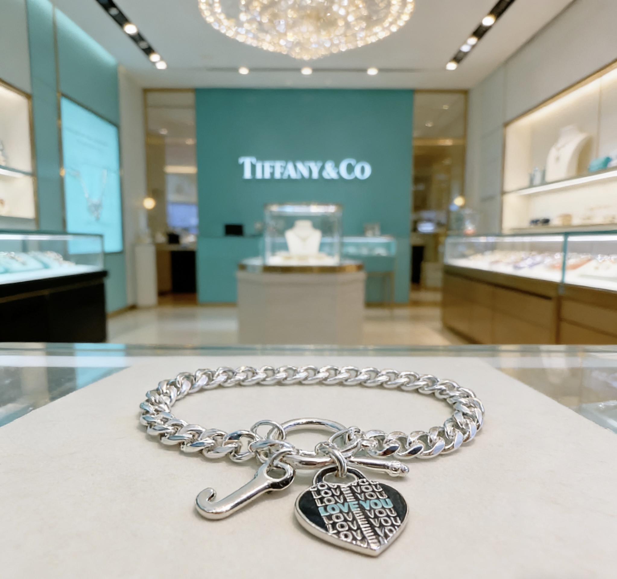 Tiffany Co Love You Heart Tag Toggle Curb Chain bracelet sterling silver with light blue enamel text accents 7 inches