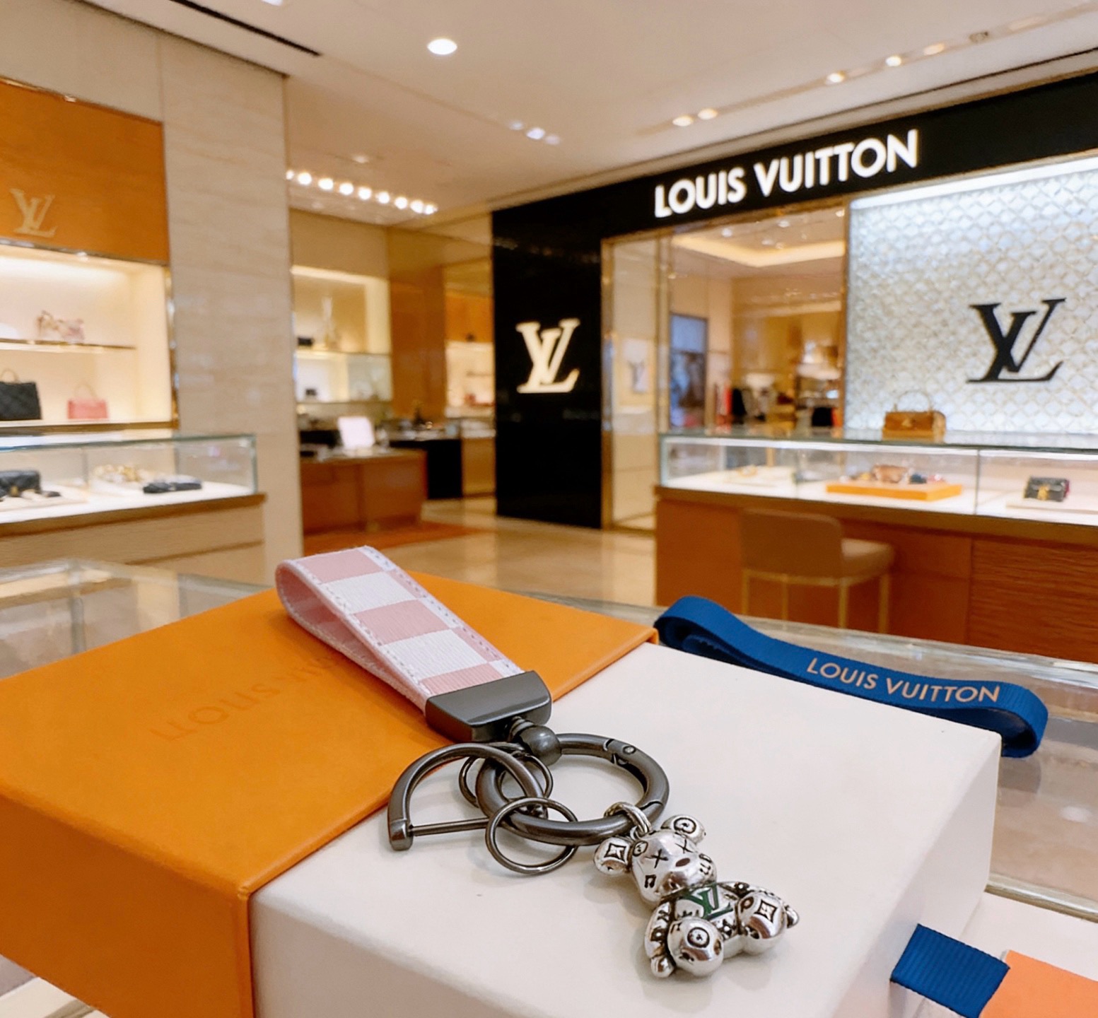 Louis Vuitton Anger Forest Bear Key Charm pendant Gunmetal gray metal silver-tone bear charm with green enamel detail pink and white damier check fabric strap blue fabric accent 12cm total length