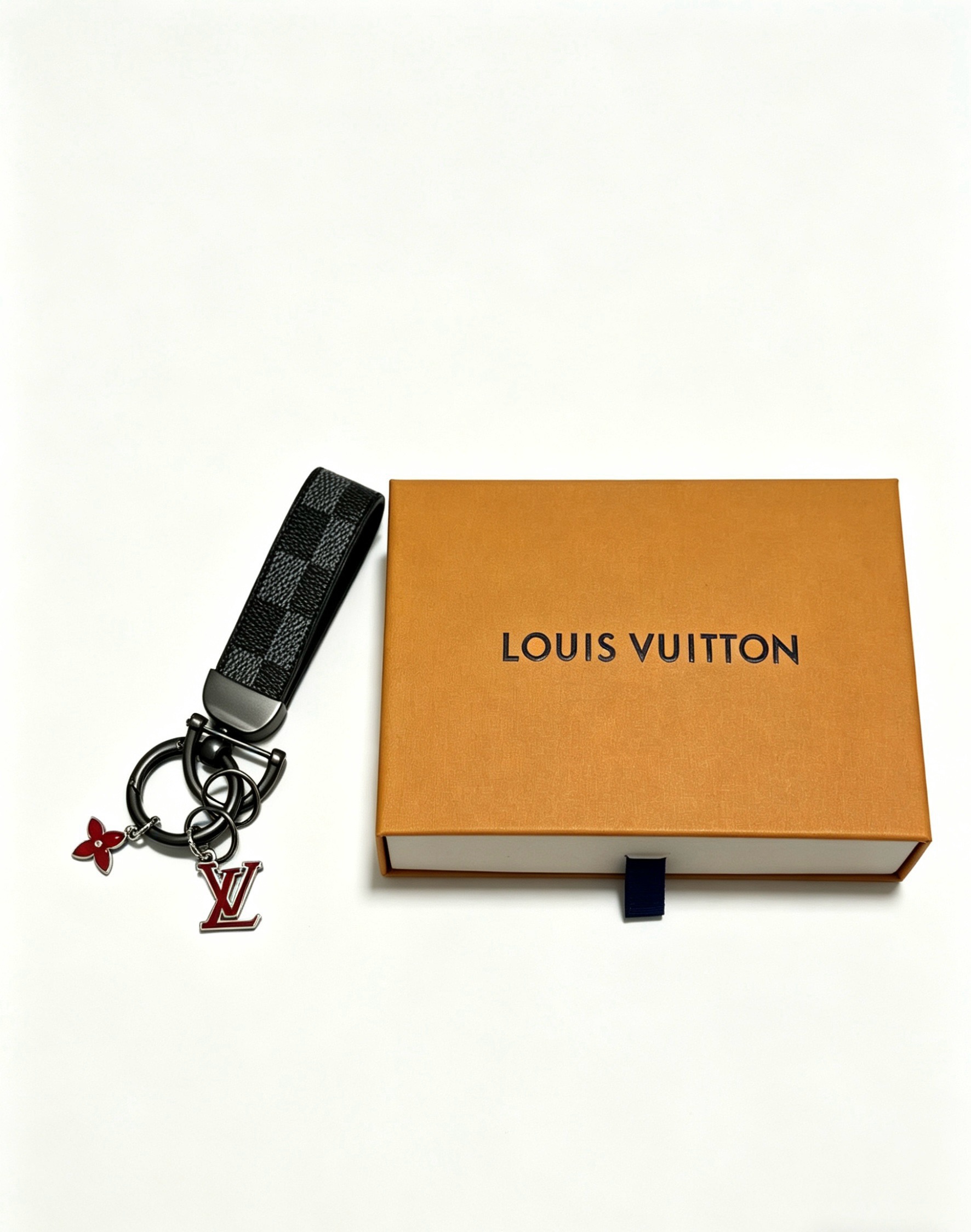 Louis Vuitton Anger Forest Keychain Charm pendant Gunmetal black hardware black graphite damier canvas strap red enamel LV and monogram flower charms with silver tone edging 12cm total length
