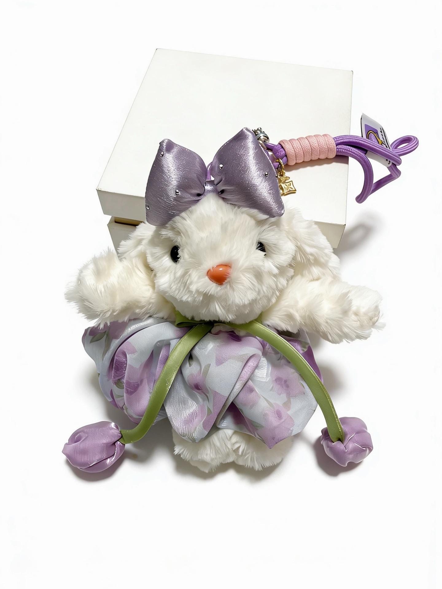Louis Vuitton Anger Forest Plush Bunny Keychain Charm pendant Gold-tone metal hardware white plush lavender satin and fabric accents pink cord wrap purple cord strap orange bunny nose black bunny eyes green ribbon accents 12cm total strap length