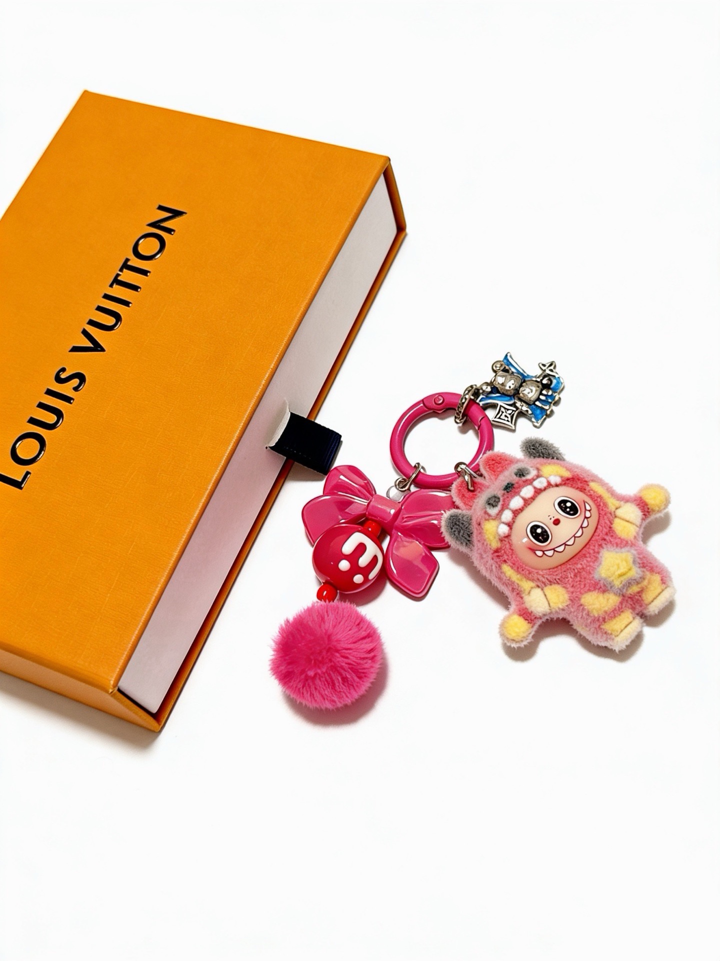 Louis Vuitton Anger Forest Custom Labubu Charm Keychain pendant Hot pink enamel and plush red enamel silver-tone metal yellow plush accents blue enamel charm white enamel details 3 5cm ring diameter 10cm total drop length