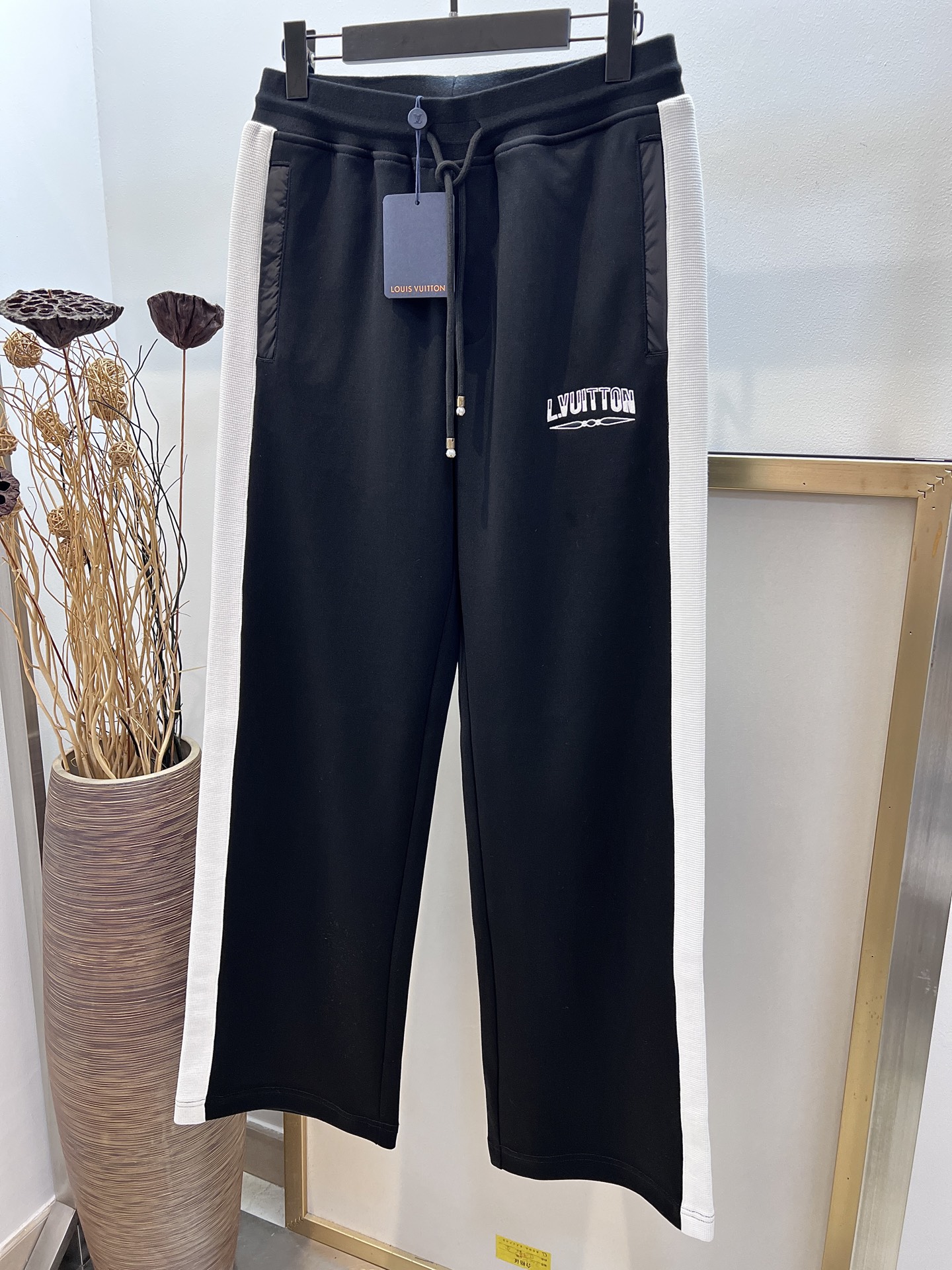 Louis Vuitton Black Track Pants with White Side Stripe - Stylish & Comfortable 3 i1755028204340 46 0 1