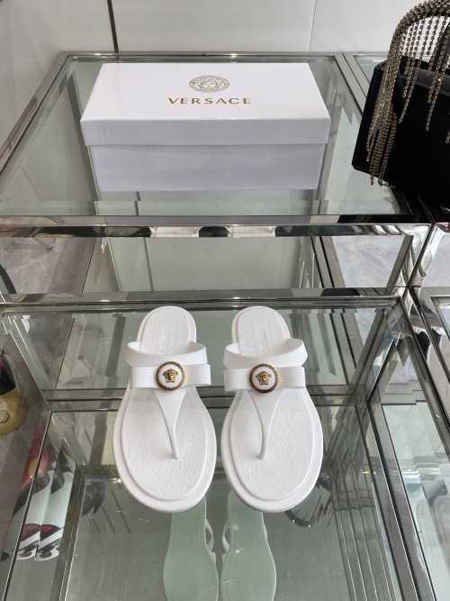 Versace Jelly Thong Sandals with Iconic Medusa Logo - Chic & Comfortable 1 Versace Jelly Thong Sandals with Iconic Medusa Logo - Chic & Comfortable