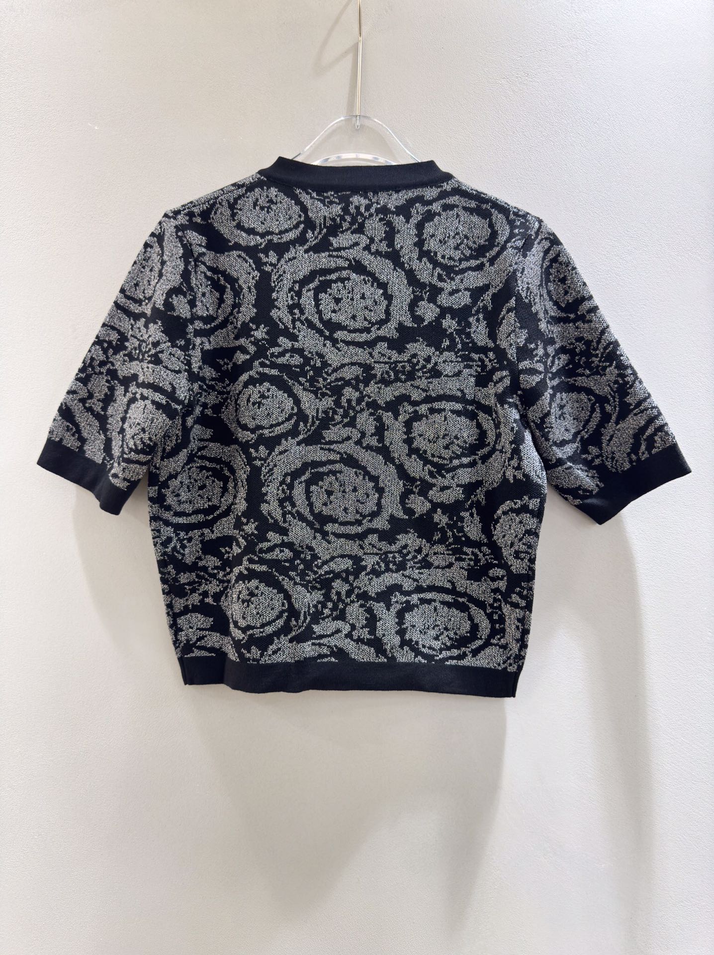 Versace black short sleeve knit cardigan with color block print and shimmer.-Big cat