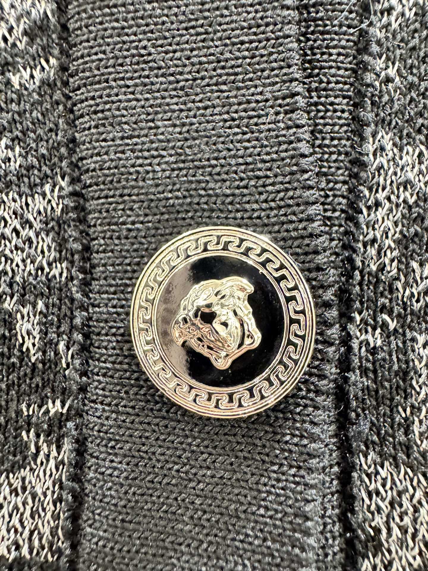 Versace black short sleeve knit cardigan with color block print and shimmer.-Big cat