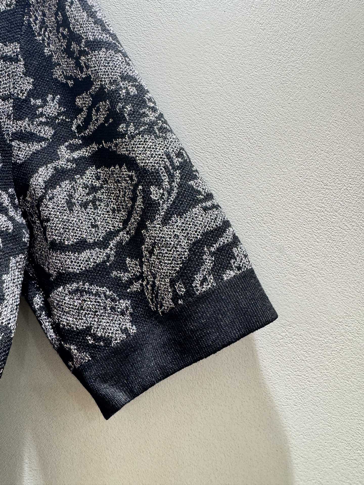 Versace black short sleeve knit cardigan with color block print and shimmer.-Big cat