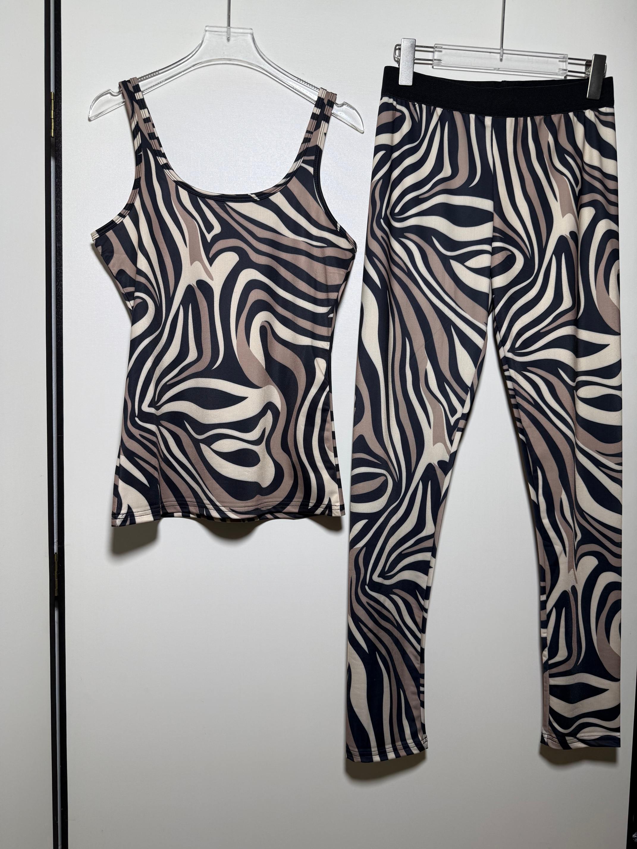 NO:822935,Popular suit series Women's leopard print stretch slimming vest Printed stretch leggings Small leg pants Yoga sports suit two-piece set.SMLXL, women's clothing,19860909套装爆款系列 女士豹纹印花弹力修身显瘦背心印花弹力紧身裤小脚裤 瑜伽运动套装两件套.SMLXL,女装,,Women's clothing