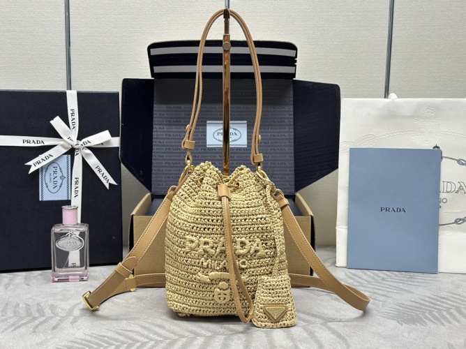 Prada Raffia Bucket Bag with Leather Straps - Stylish & Versatile 1 Prada Raffia Bucket Bag with Leather Straps - Stylish & Versatile