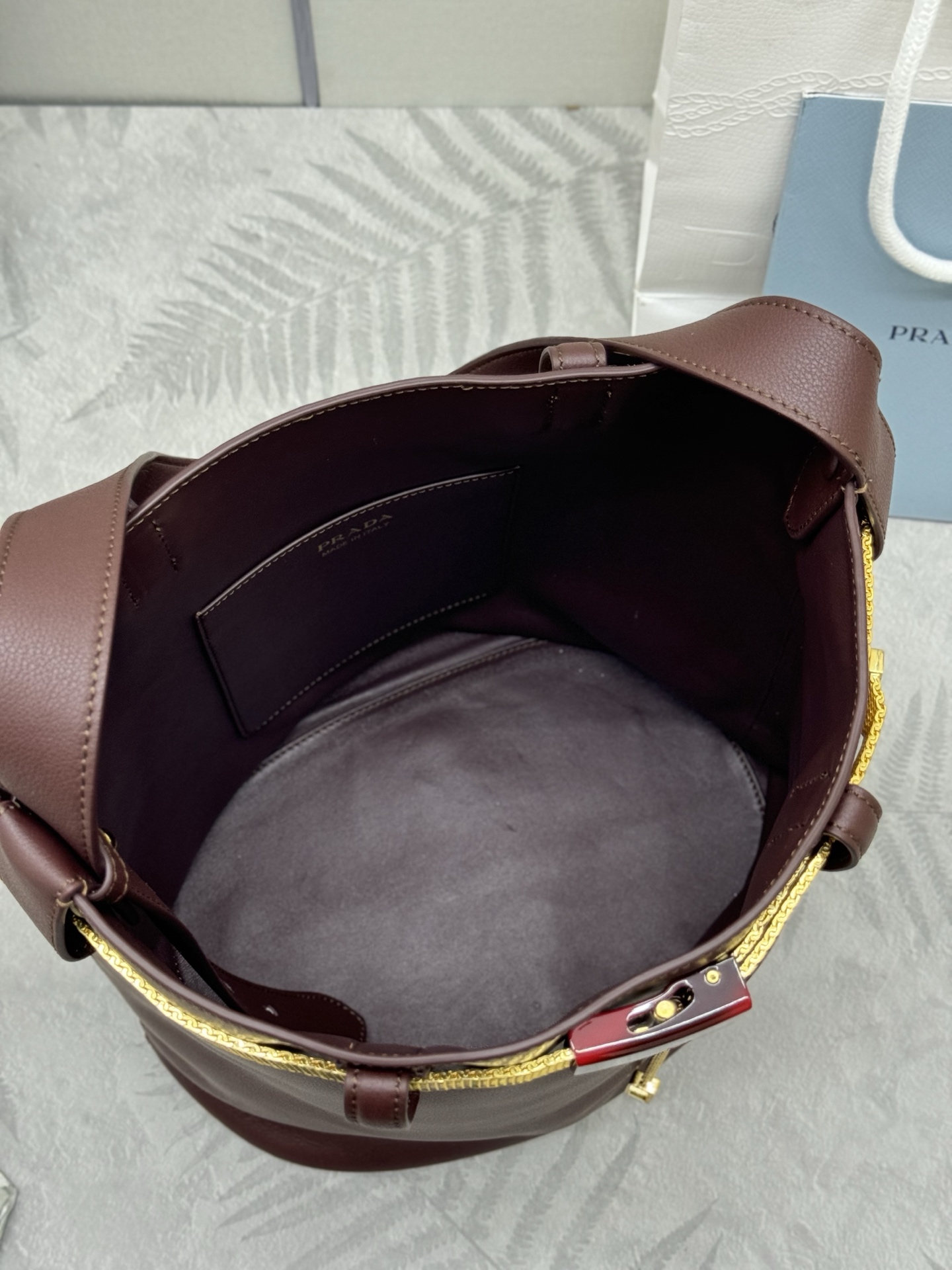 Prada Buckle Leather Bucket Bag with Belt Detail - Stylish & Versatile 8 i1747888825012 6890 0 6