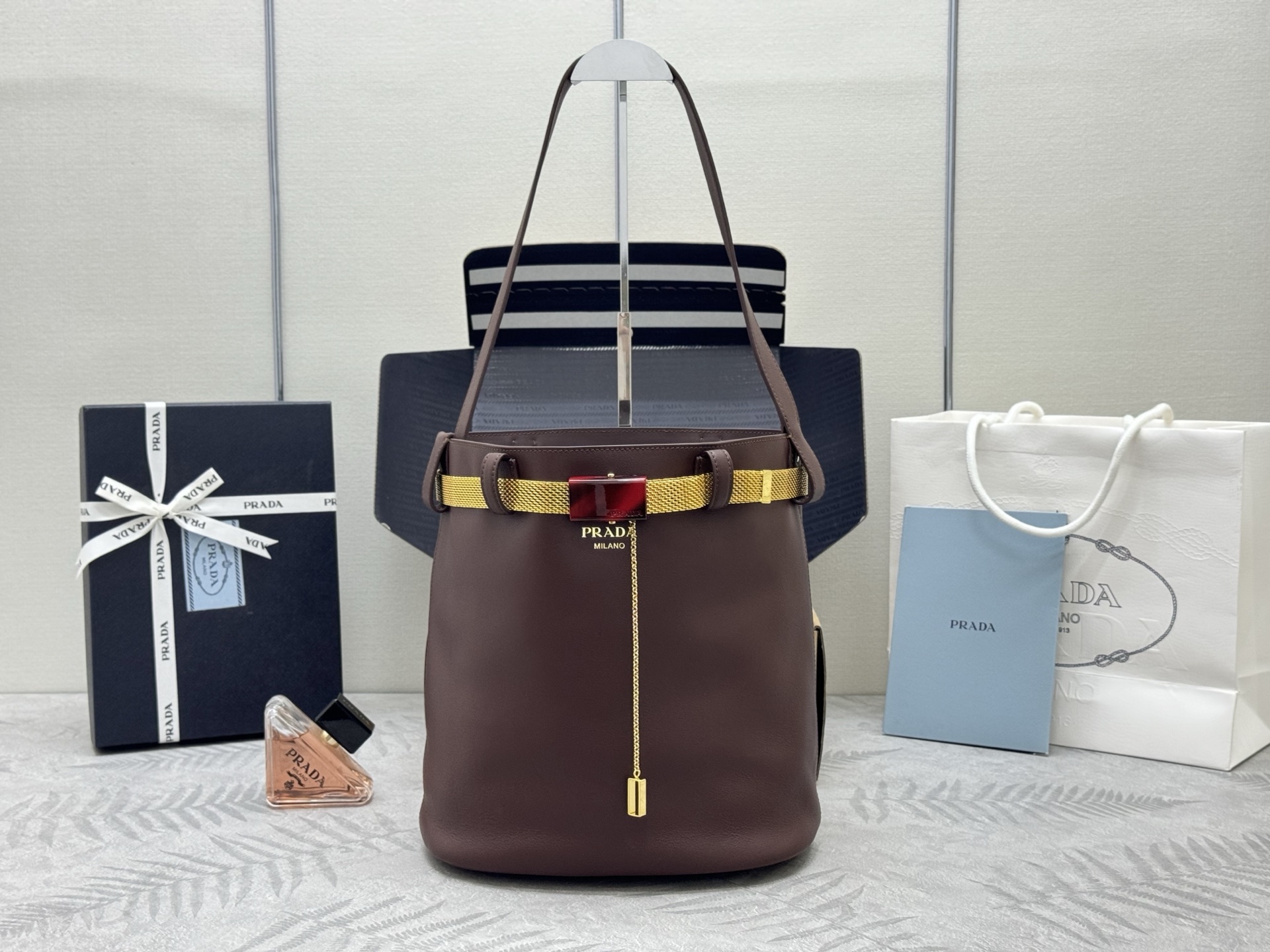 Prada Buckle Leather Bucket Bag with Belt Detail - Stylish & Versatile 2 i1747888940041 7835 0 0