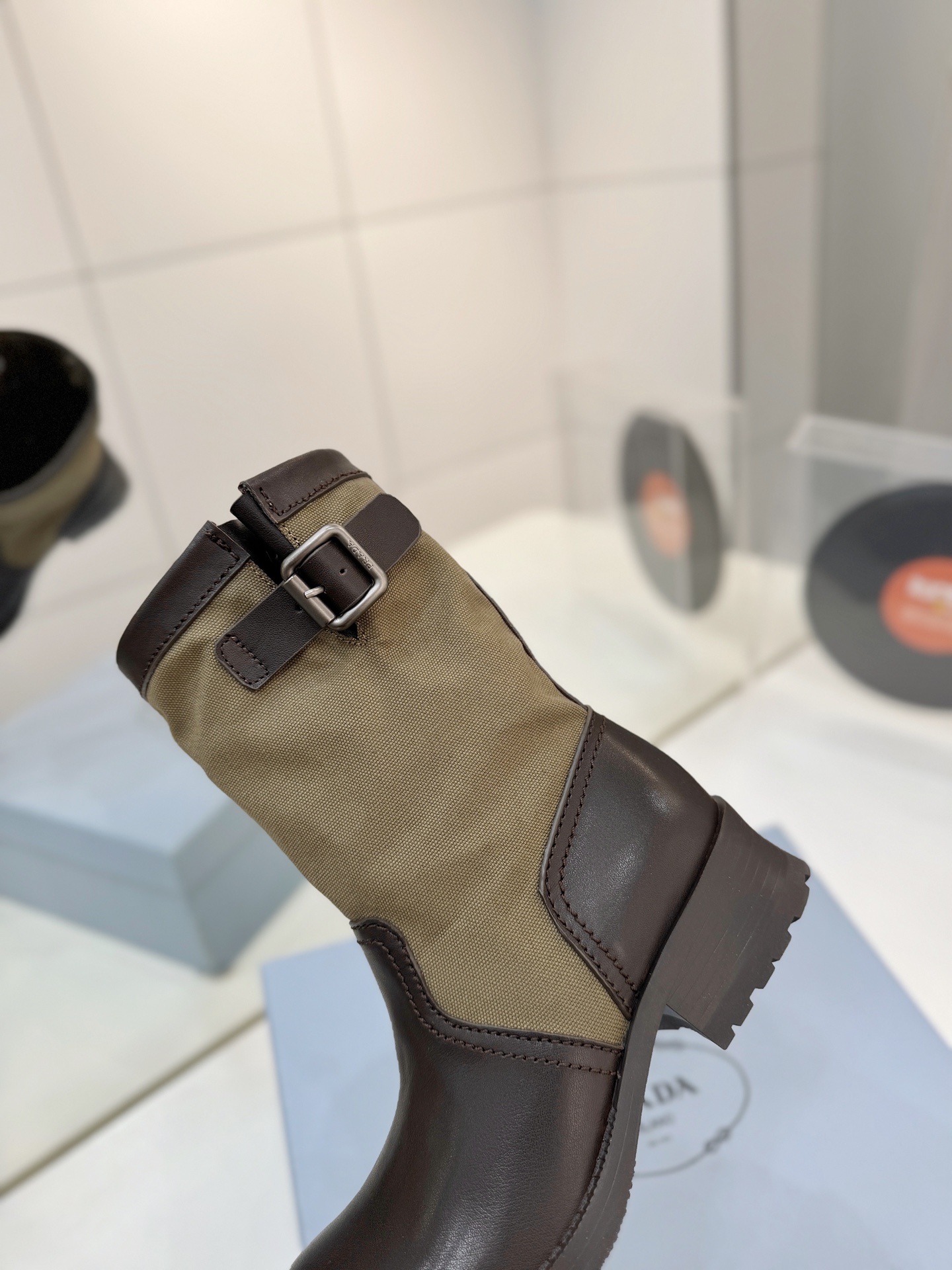Prada Leather & Canvas Buckle Mid-Calf Boots