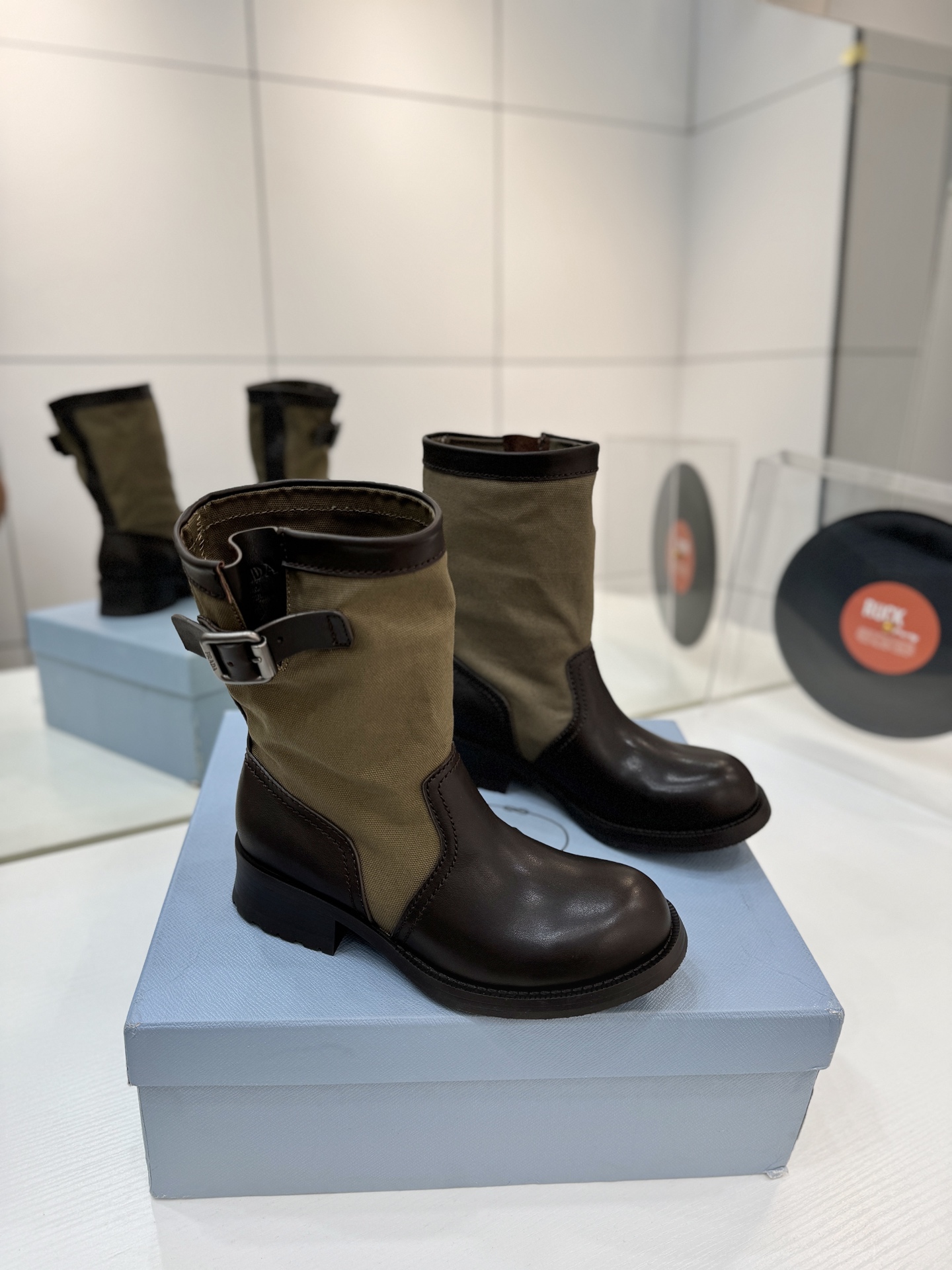 Prada Leather & Canvas Buckle Mid-Calf Boots