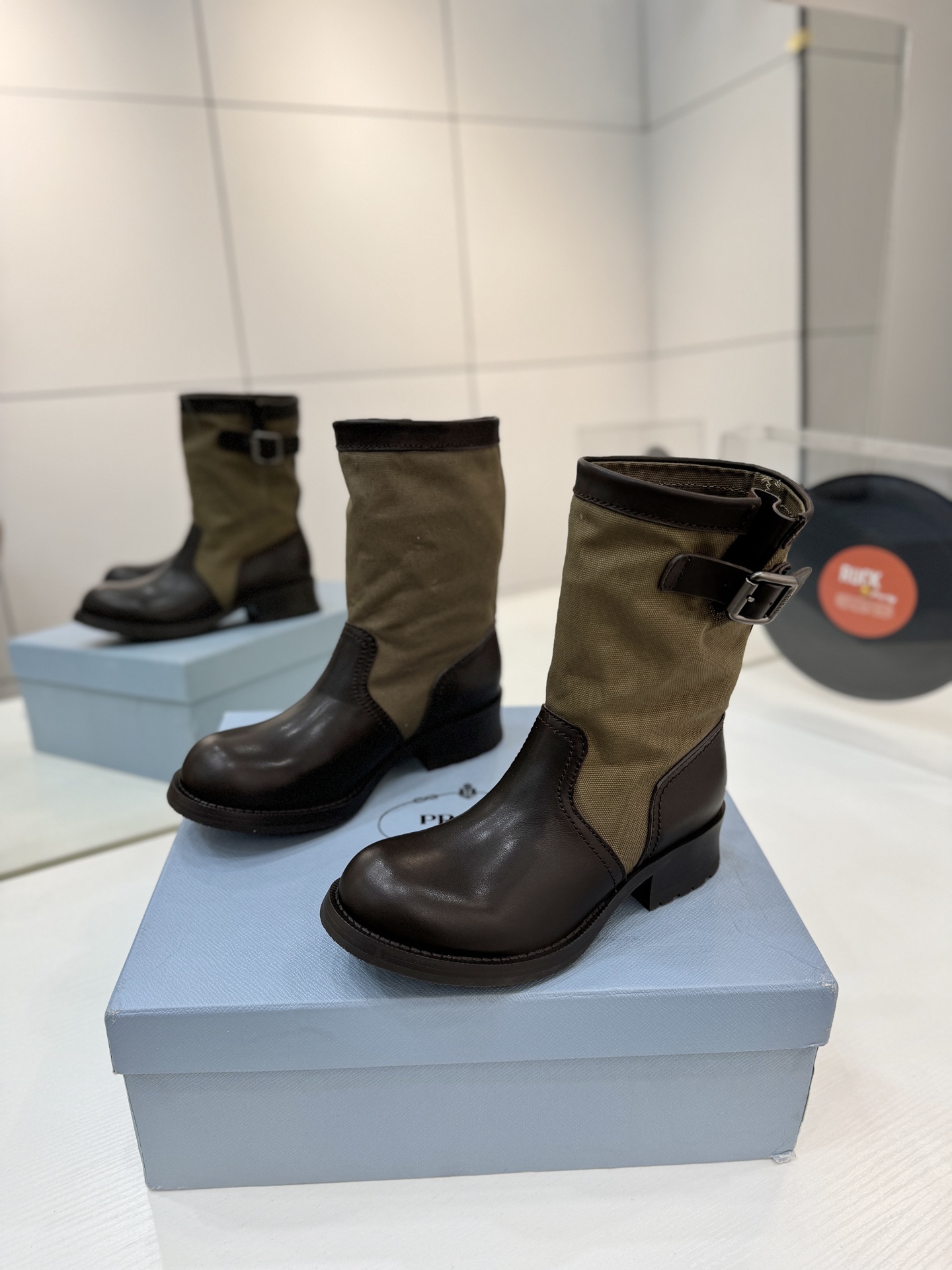 Prada Leather & Canvas Buckle Mid-Calf Boots