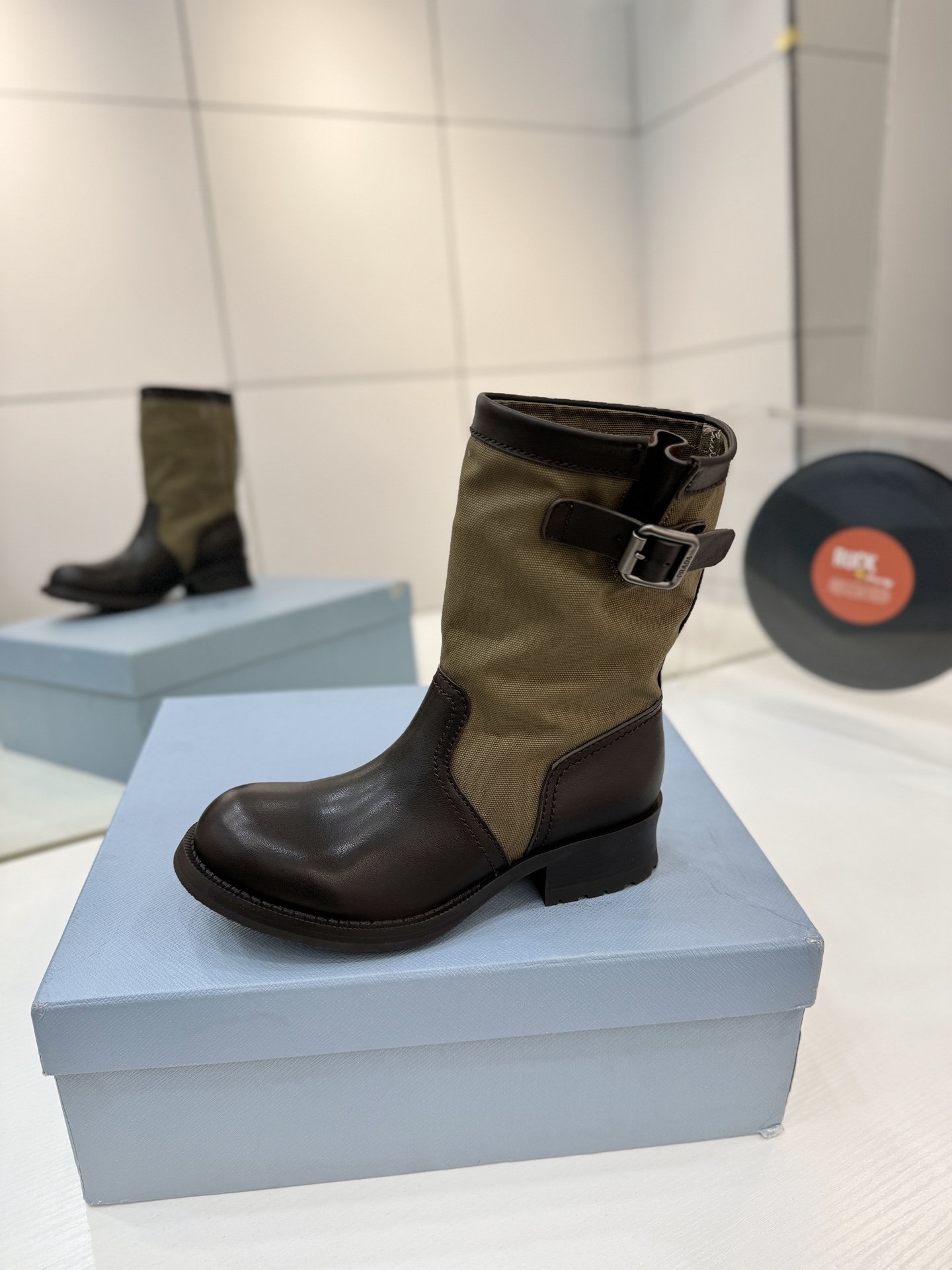 Prada Leather & Canvas Buckle Mid-Calf Boots
