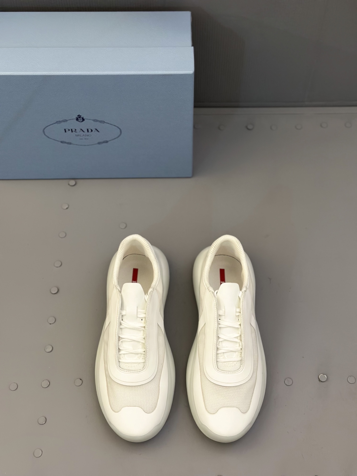 Prada White Leather Sneakers for Men - Italian Craftsmanship & Comfort 2 i1744709611073 1132 0 0