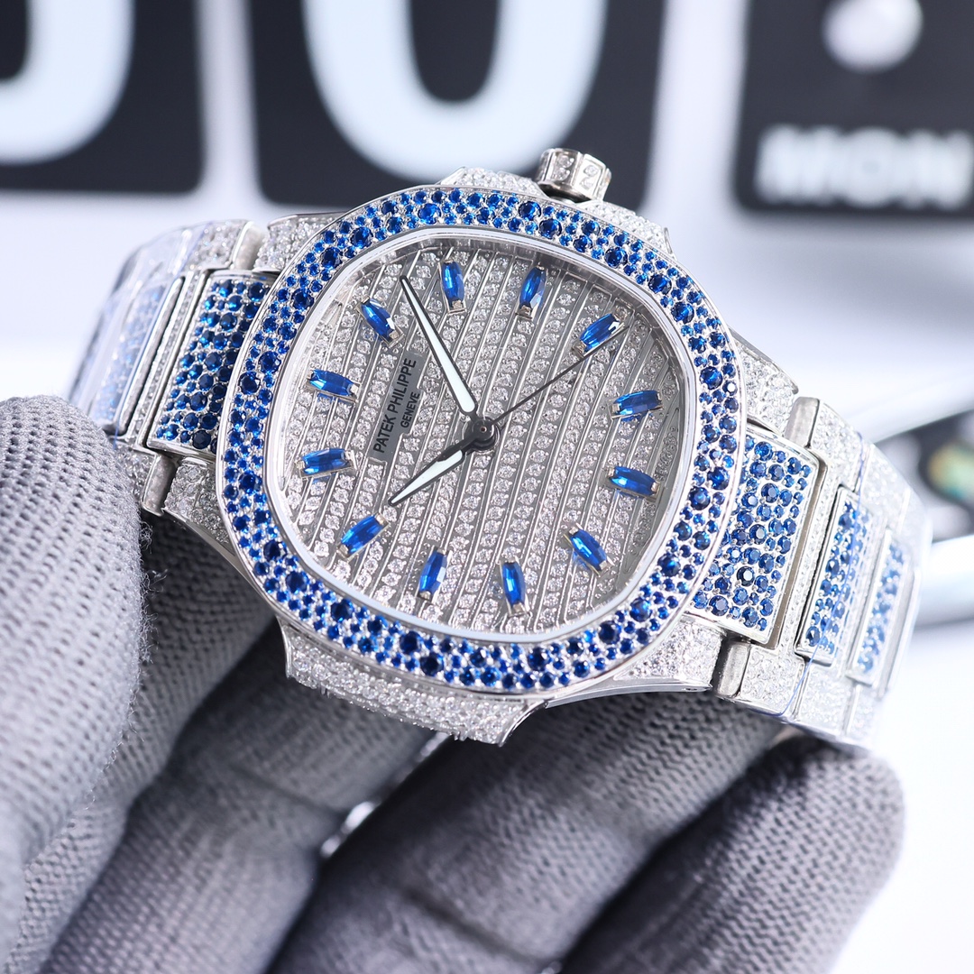 NO:156943,[Recommended for GR Factory wall cracks, a high price to create a classic timepiece] - Patek Philippe Ladies Nautilus Full Diamond Limited Edition Model, a small quantity arrives!  The three full diamond watches are inlaid with three different colors of gemstones: ruby, sapphire and emerald!  Limited supply (the whole body uses eight hearts and eight arrows natural Orbo rhinestones) 1 watch: customized modified 324 S automatic integrated winding mechanical movement, large center second hand!  2 Dial: Pavé diamonds, with 286 diamonds 3 Case: Pavé has 518 diamonds, with sapphire crystal permeable cover. 4 diameter 35.2MM!  5 bracelet: The rare 