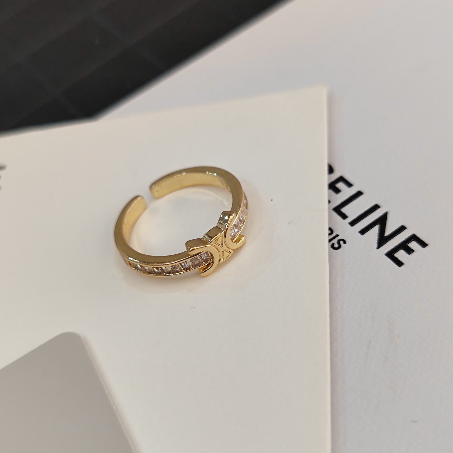 Celine Celestial Ring New: Star & Moon Motif with Pavé Crystal Details 10 a1716053378225 5785