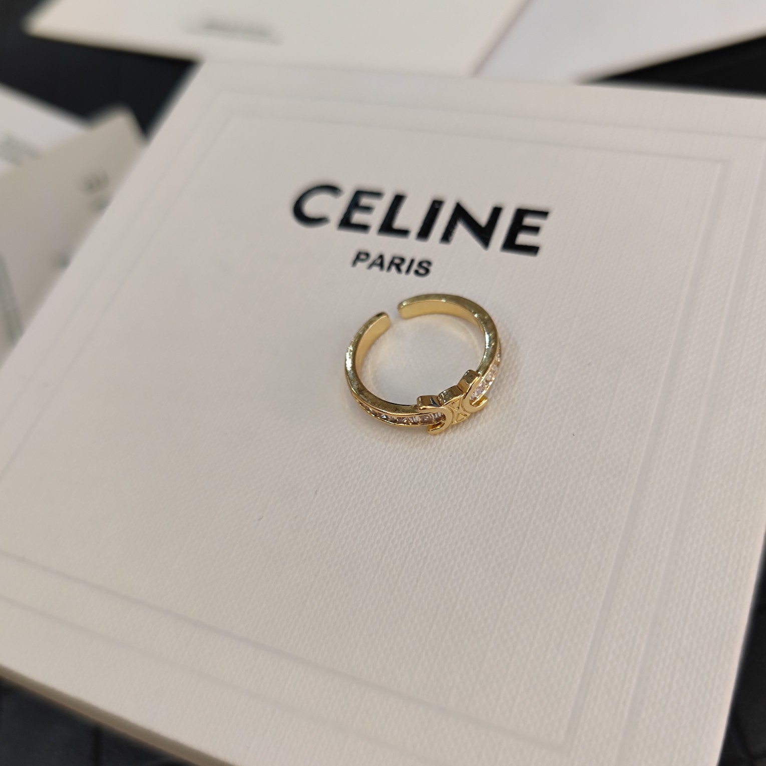 Celine Celestial Ring New: Star & Moon Motif with Pavé Crystal Details 8 a1716053378255 7614