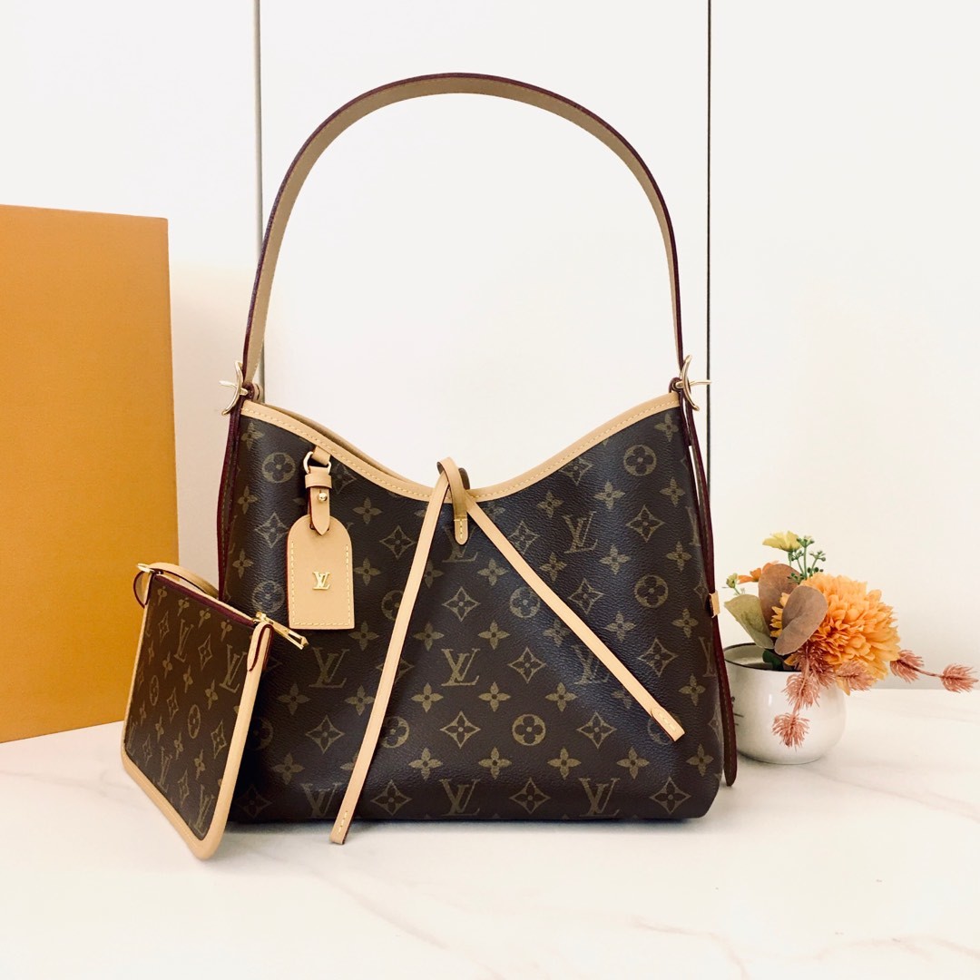 ,M46203 推出崭新 CarryAll 手袋,以 Monogram 帆布和皮革饰边塑造贴合身形的设计