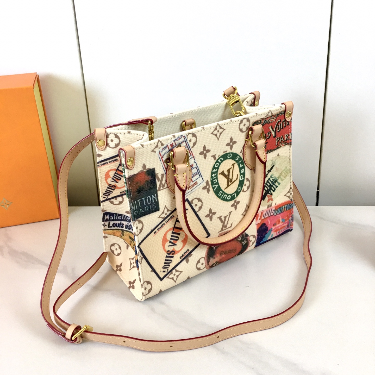 OnTheGo 小号手袋 - 春の新色モノグラム